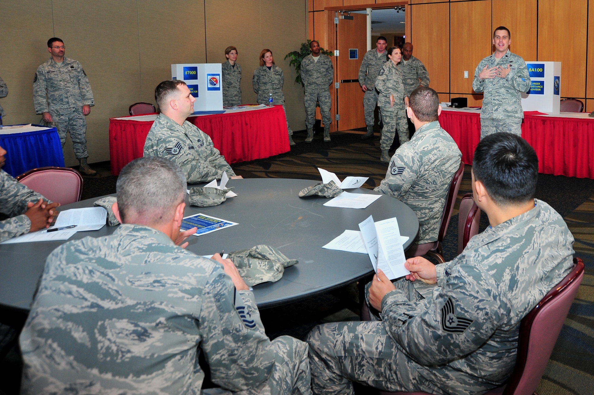 Lt. Col. Kyle Head, 325th Force Support Squadron commander, briefs members of Team Tyndall during the Developmental Special Duty Job Fair March 7 at the Horizons Community Center. (U.S. Air Force photo by Staff Sgt. Rachelle Blake)