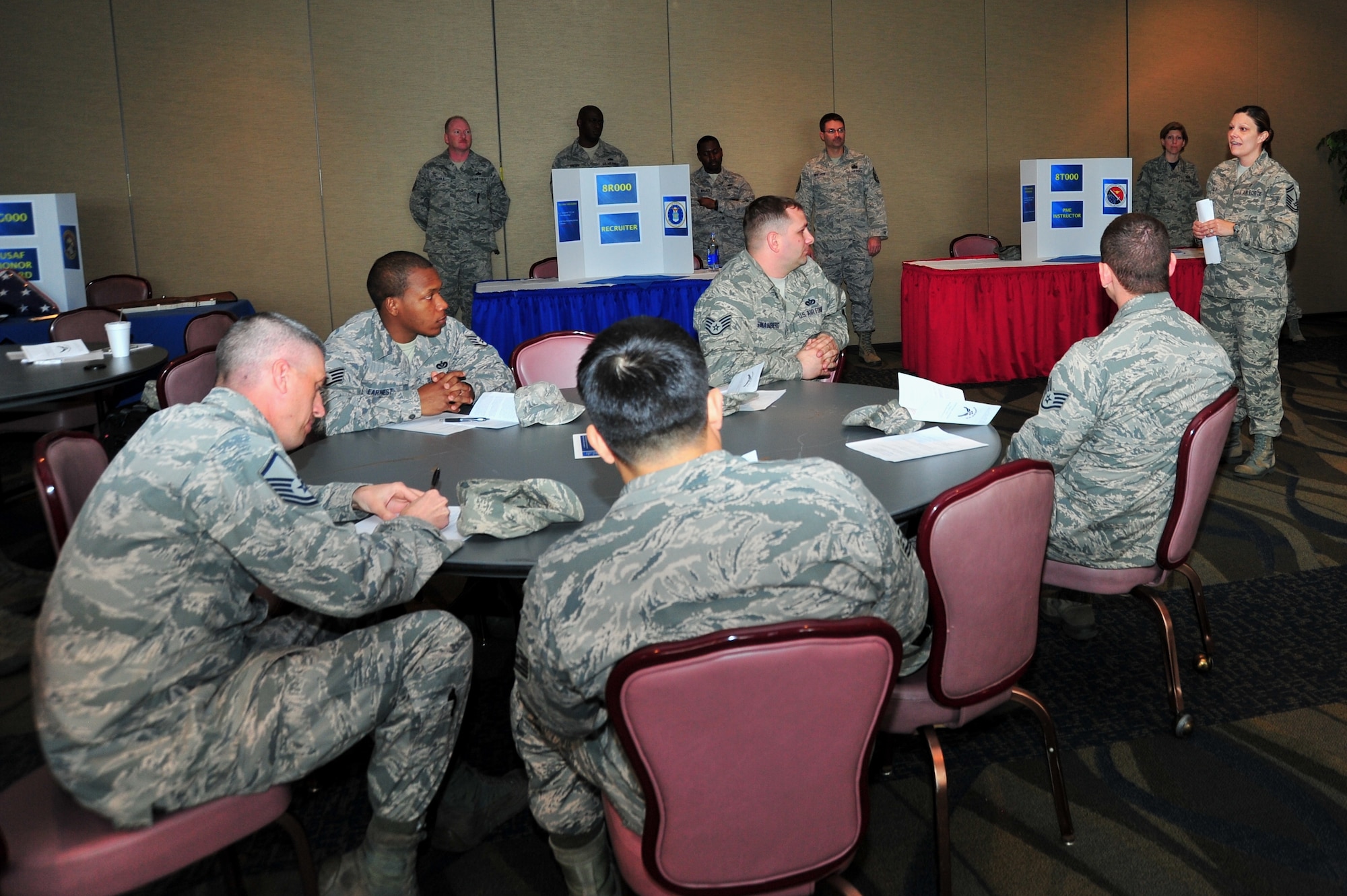 Senior Master Sgt. Kristy Earls, 325th Force Support Squadron career assistance advisor, briefs members of Team Tyndall during the Developmental Special Duty Job Fair March 7 at the Horizons Community Center. (U.S. Air Force photo by Staff Sgt. Rachelle Blake)