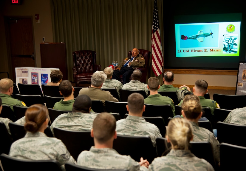 Retired Lt. Col. Hiram Mann, a Tuskegee Airman, visits the 16th Airlift Squadron March 6, 2014, at Joint Base Charleston – Air Base, S.C. Entering the Army Air Corps as a pre-aviation student in 1942, Mann was assigned to the 100th Fighter Squadron of the 332nd Fighter Group, the Red Tail Angels, in Italy. (U.S. Air Force photo/Staff Sgt. William O’Brien)