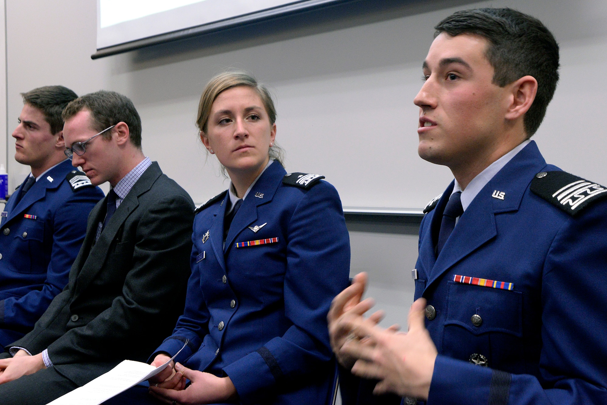 Cadets 1st Class Nathan Orrill (right) and Jessica Adams, members of the Holocaust panel, discuss feedback from their fellow cadets during their "Leadership Lessons of the Holocaust: A Cadet's Perspective" presentation here Feb. 27. (Mike Kaplan/Air Force photo)