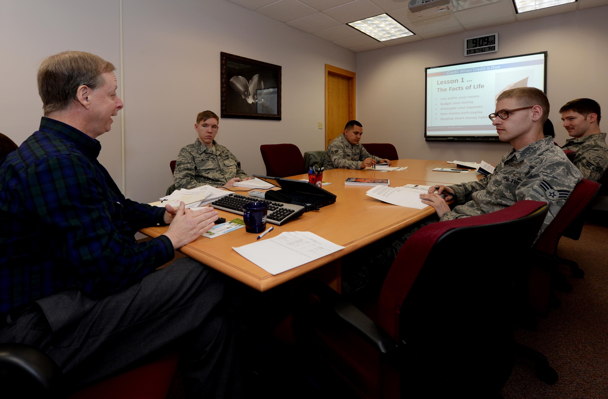 Terry Mills, Consumer Credit Counseling Service education and community outreach manager, discusses some of the keys to sound finances with Airmen during a “Credit When Credit is Due” course in the Airman and Family Readiness Center at Ellsworth Air Force Base, S.D., March 6, 2014. The course is designed to familiarize Airmen with financial tools and resources and help them develop a better understanding of money management. (U.S. Air Force photo by Airman 1st Class Rebecca Imwalle/ Released)