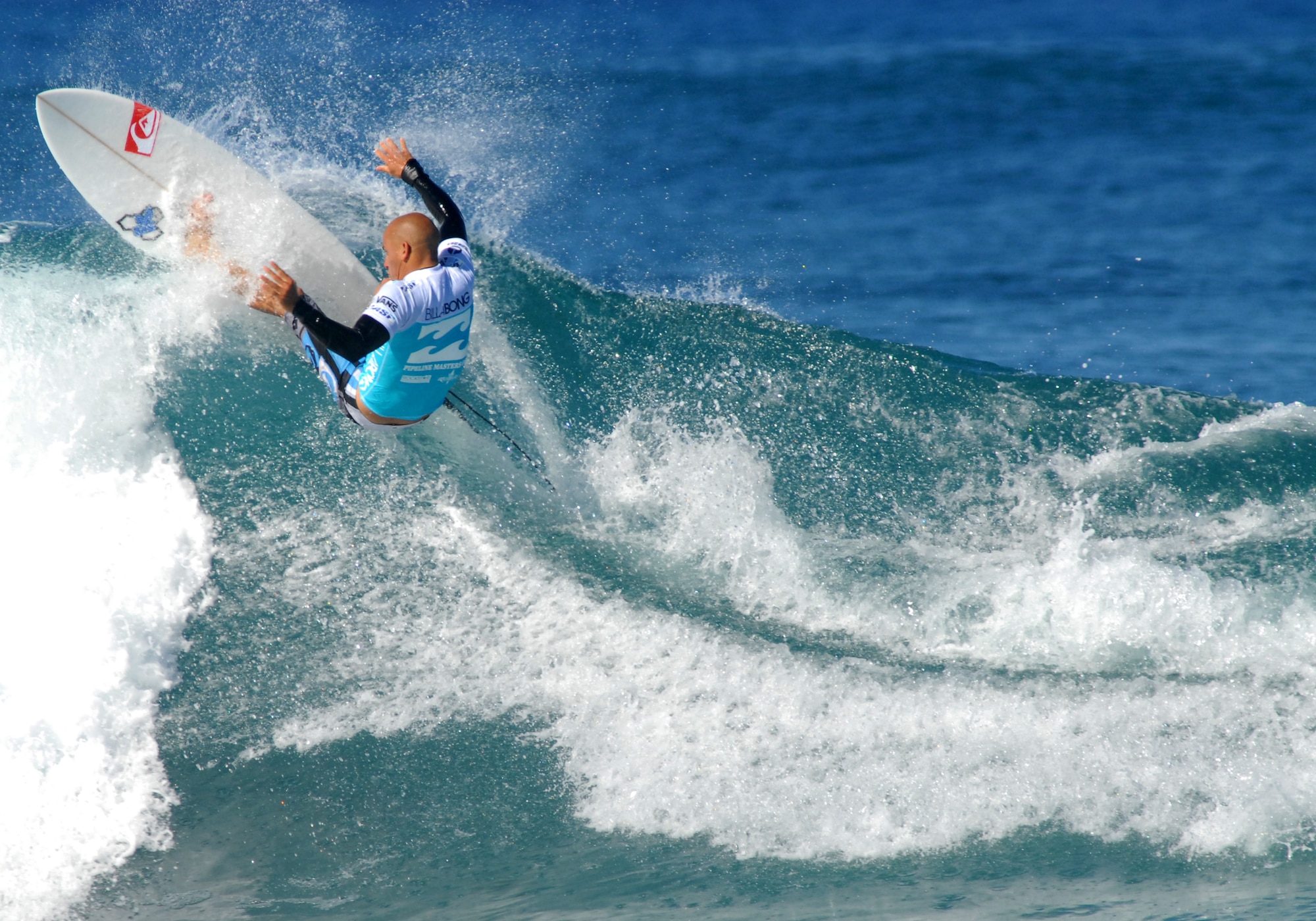 NORTH SHORE, Hawaii -- Kelly Slater, nine-time world champion surfer, carves Banzai Pipeline with a frontside cutback Dec. 12 at the Billabong Pipeline Masters surf competition. (U.S. Air Force photo/Staff Sgt. Mike Meares) 