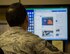 A Public Affairs Airman reviews social media products as part of his daily duties, March 6, 2014, at Joint Base Pearl Harbor-Hickam, Hawaii. Servicemembers need to be aware that even though they are encouraged to use social media, they still need to follow the guidelines in AFI 1-1 when posting. Air Force standards must be observed at all times, both on and off-duty, regardless of the method of communication used. (U.S. Air Force photo/Staff Sgt. Nathaniel Allen)