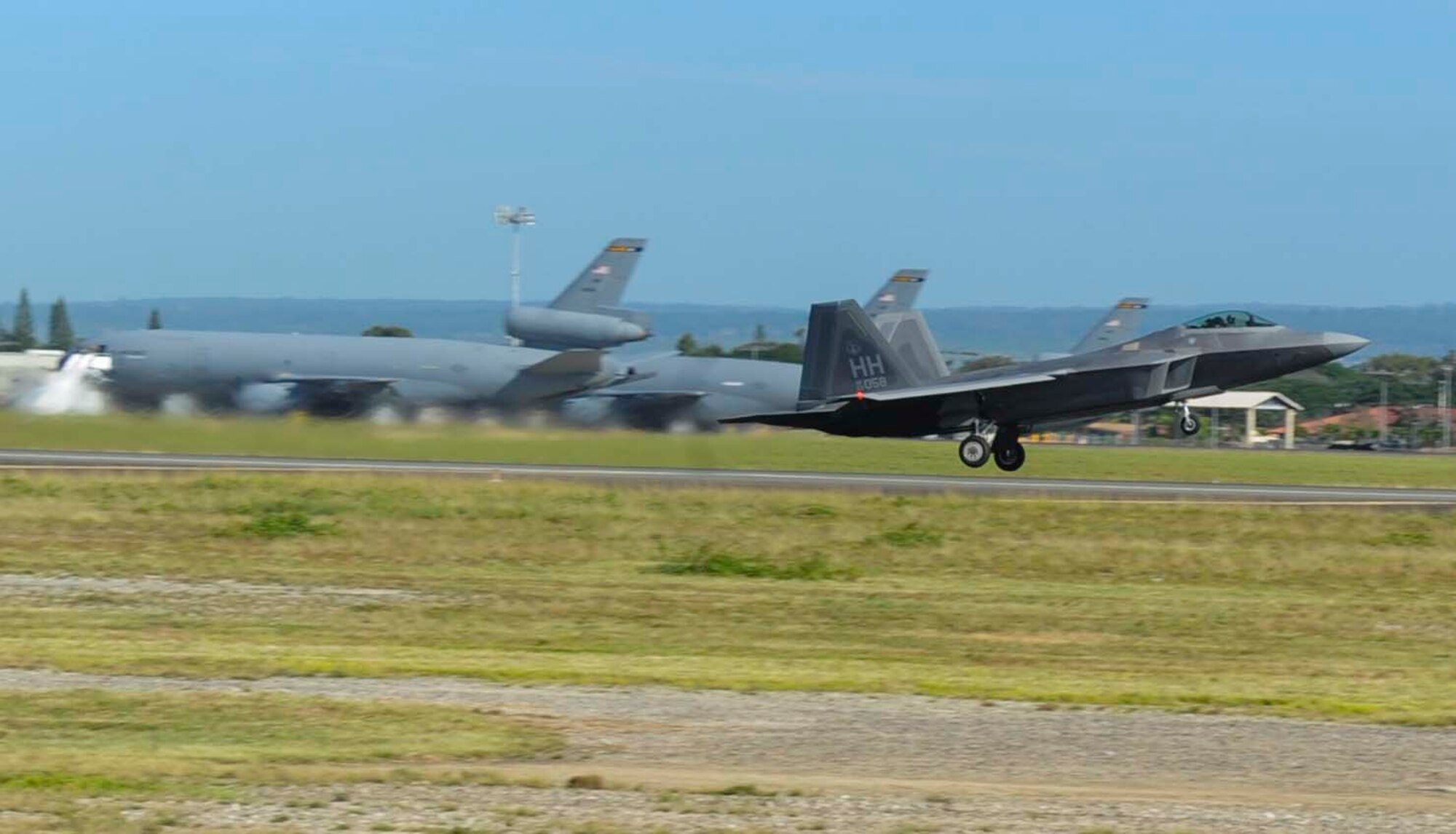 A Hawaii Air National Guard F-22 Raptor takes off from the runway on Joint Base Pearl Harbor-Hickam, Hawaii, March 6, 2014. The aircraft is participating in Sentry Aloha, an aerial combat exercise focused on offensive and defensive counter measures and fighter integration. (U.S. Air Force photo/Tech. Sgt Terri Paden)