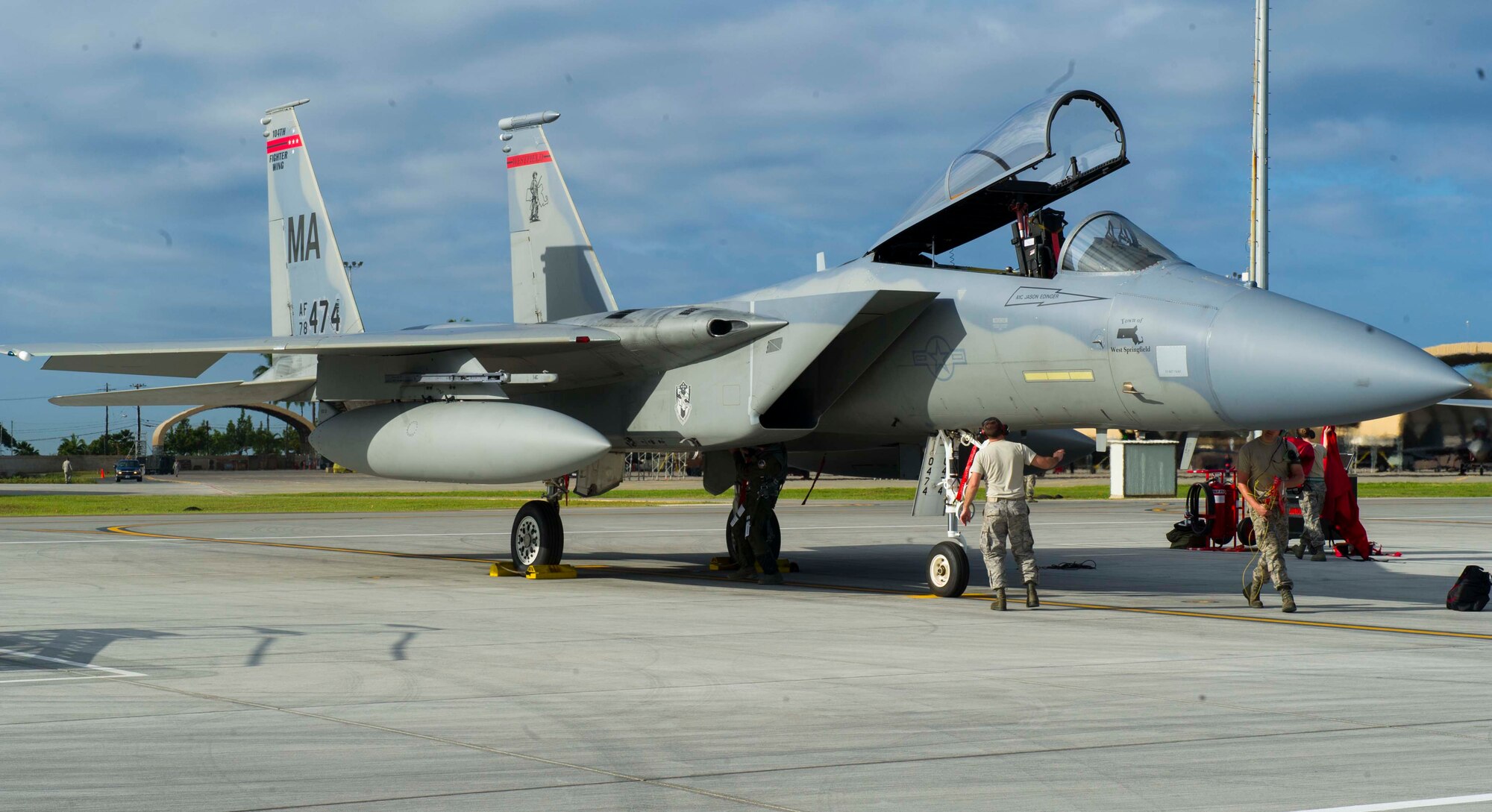 Maintenance crew members prepare an F-15 Eagle for takeoff on the flightline at Joint Base Pearl Harbor-Hickam, Hawaii, on the first day of Sentry Aloha March 6, 2014. The F-15 is deployed from the 104th Fighter Wing in Massachusetts to participate in the three week aerial combat exercise. (U.S. Air Force photo/Tech. Sgt Terri Paden)