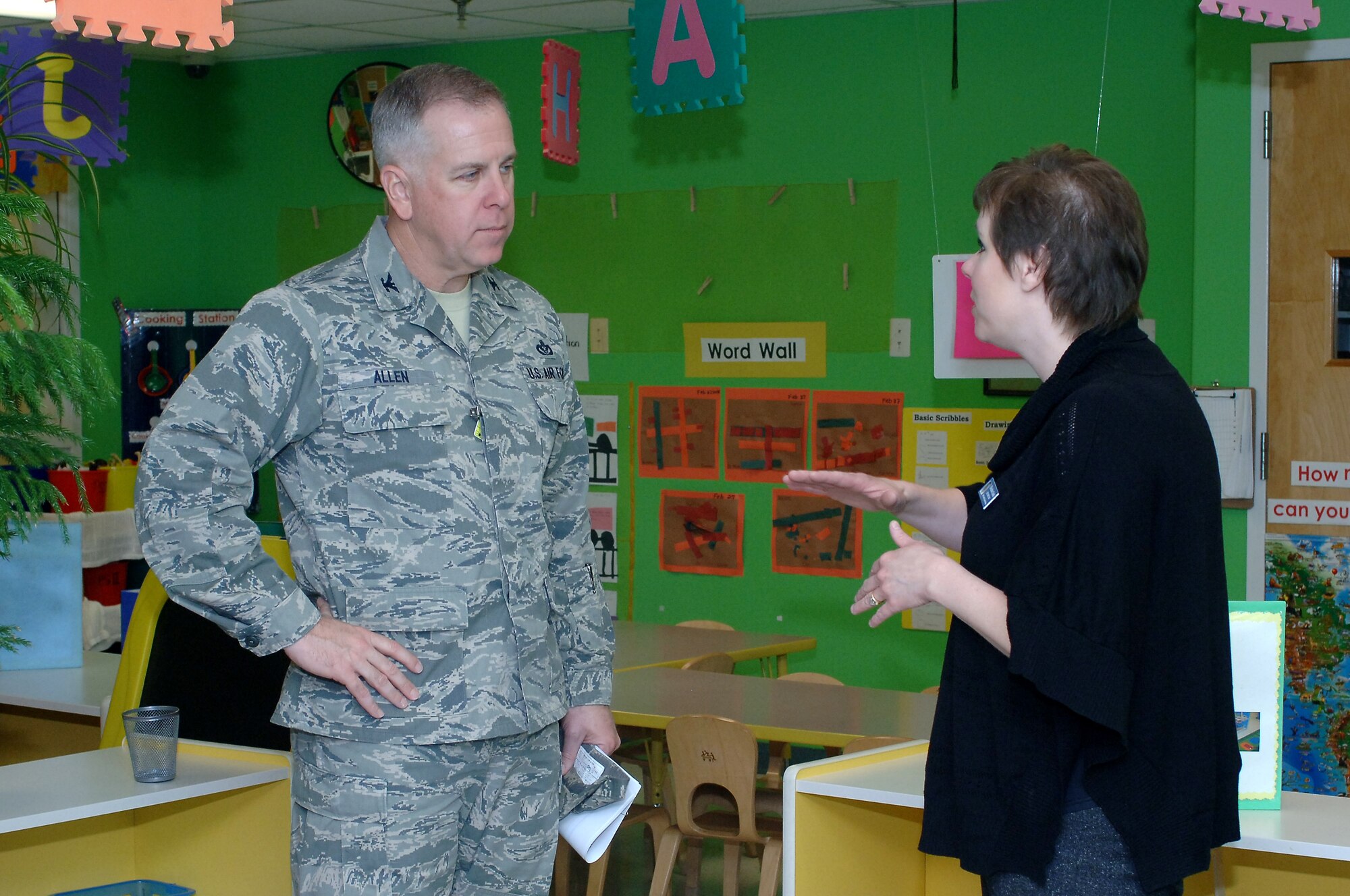 U.S. Air Force Col. John J. Allen Jr., Joint Base Langley-Eustis installation commander, tours a classroom at the Madison Child Development Center with Christine Stiefel, CDC director, during a visit to Fort Eustis, Va., Mar. 6, 2014. Allen toured various facilities to gain a better understanding of the support services available to Service members at Fort Eustis. (U.S. Air Force photo by Senior Airman Teresa J.C. Aber/Released)