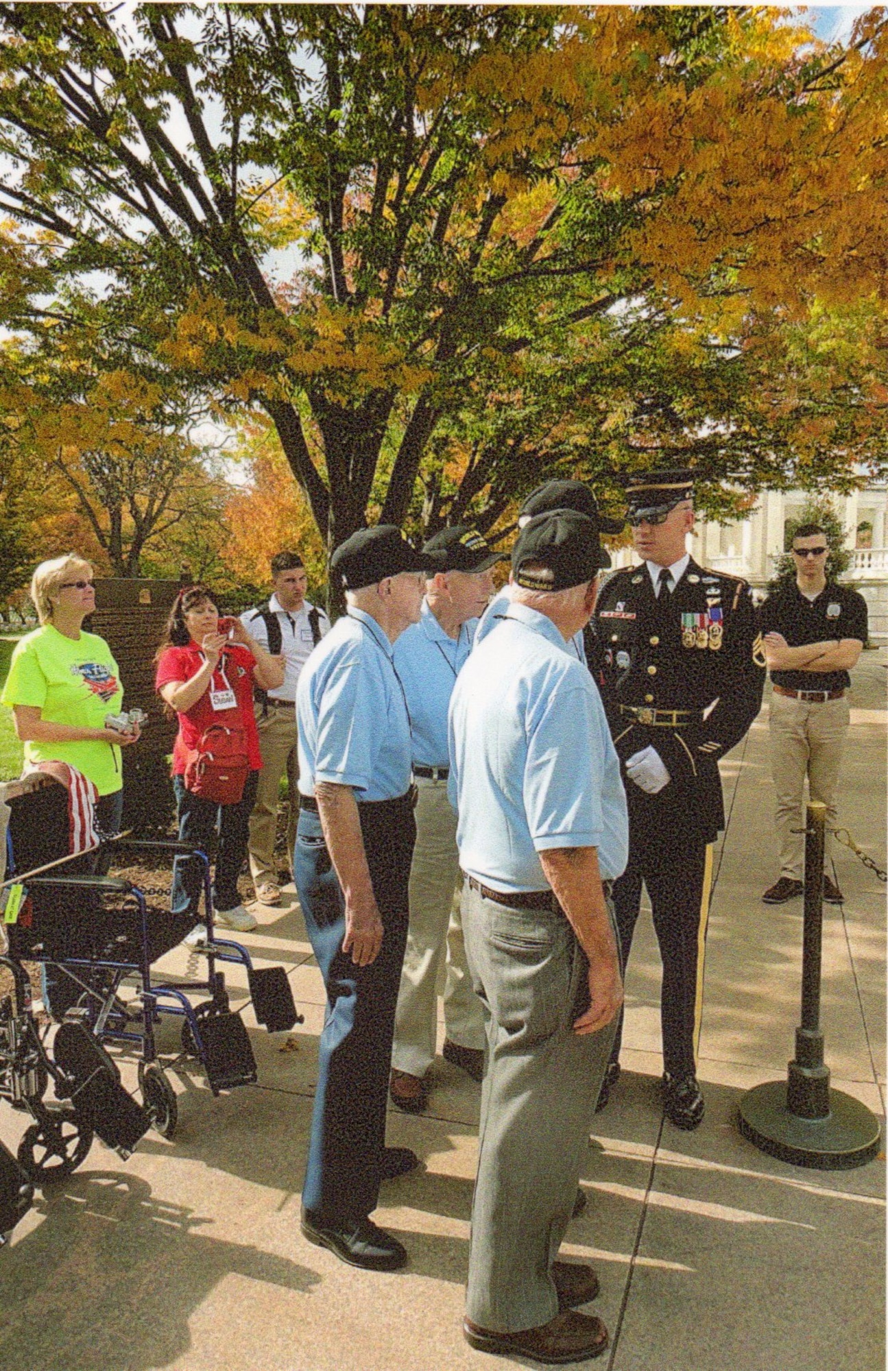 Allen Larsen and three other Austin Honor Flight veterans from Lakeway, Texas, receive instructions from the U.S. Army Sergeant at the Tomb of the Unknown Soldier before they take part in a memorial ceremony.  