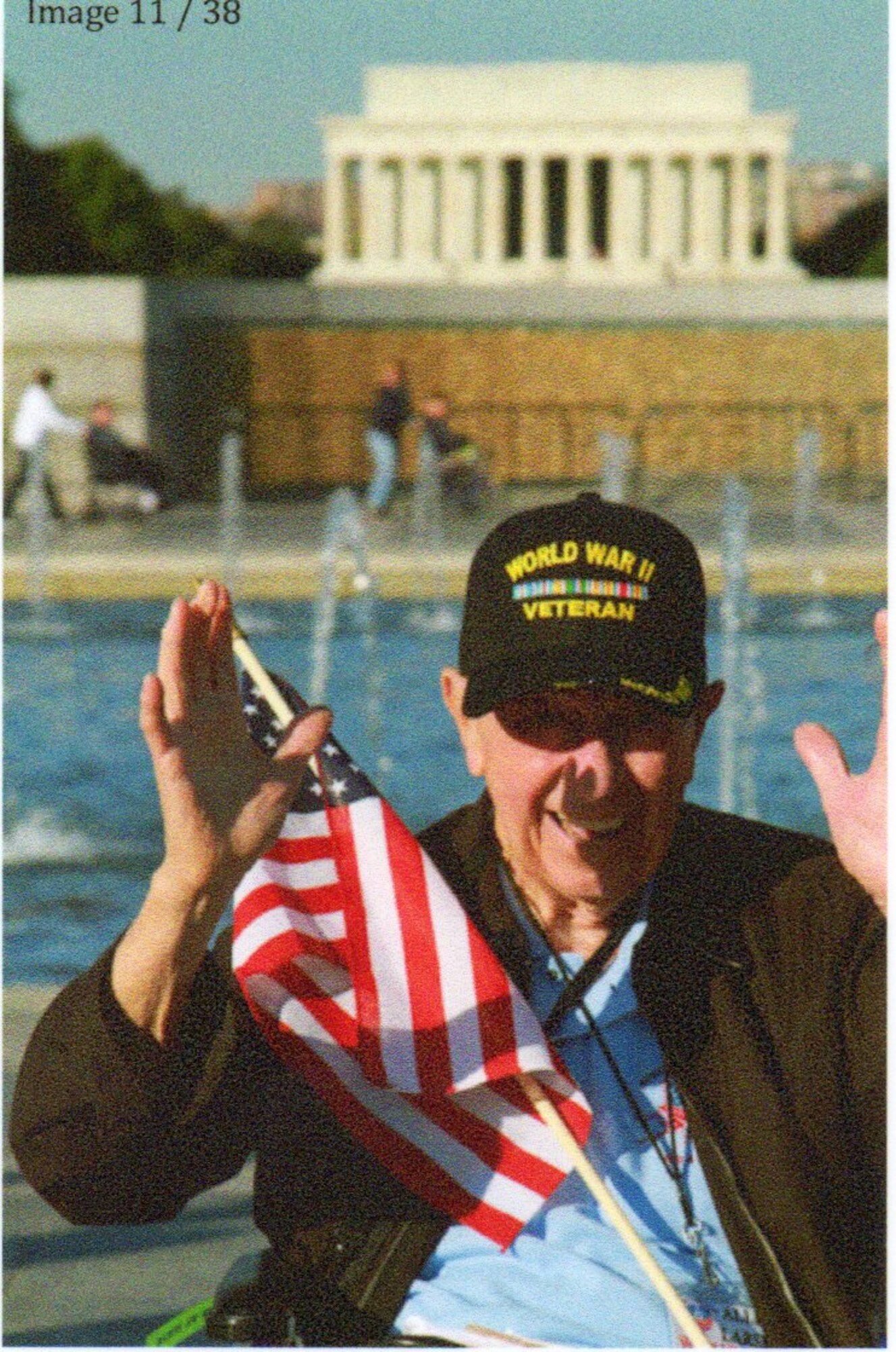 A patriotic Allen Larsen shows his appreciation at the World War II Memorial, Washington, D.C., November 2, 2013.