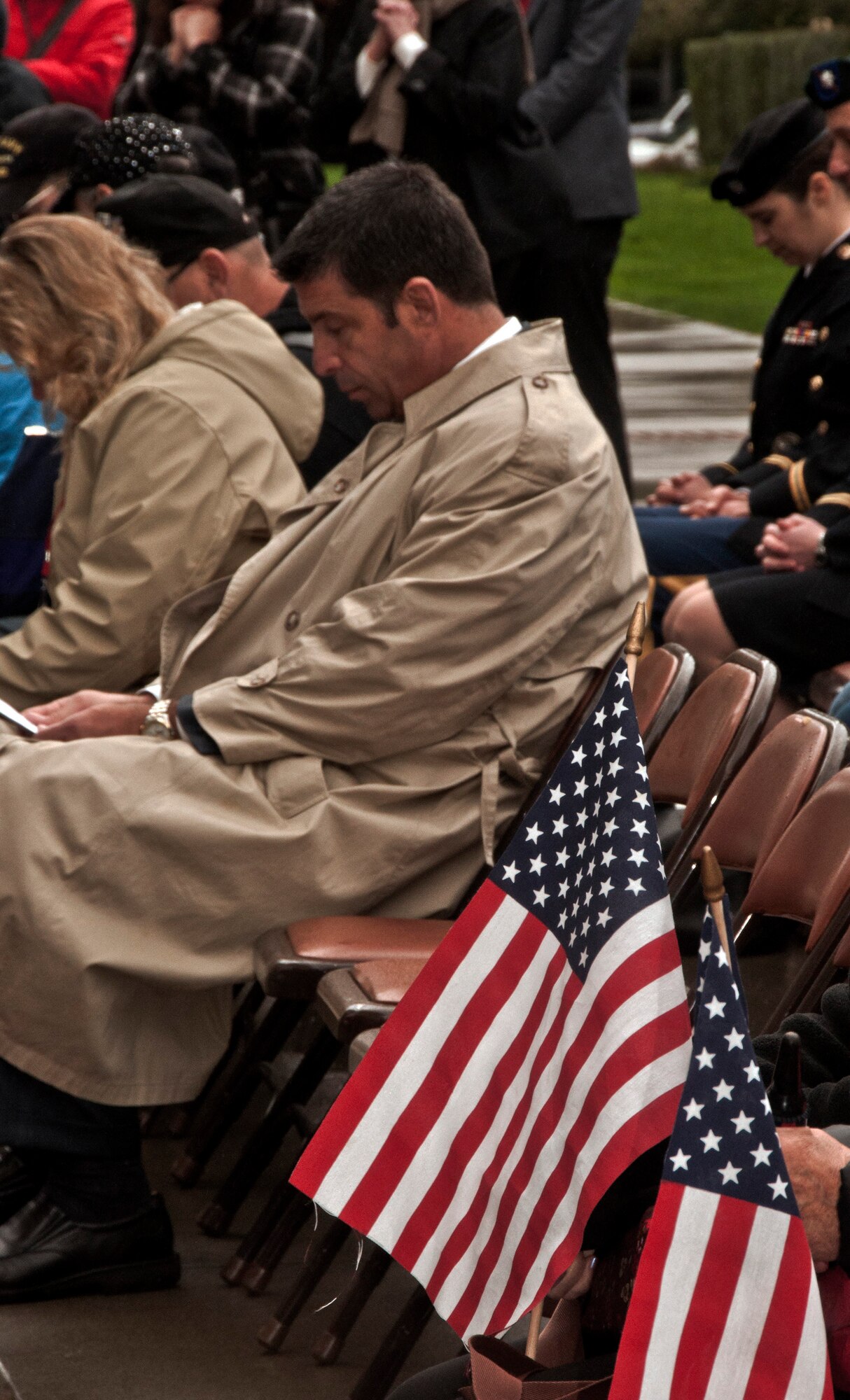 Tony Cordero sits in the crowd during the opening ceremony of The Wall That Heals Feb. 27. Tony Cordero attended in remembrance of his father, William Cordero, who was killed in action in the Vietnam conflict. (U.S. Air Force photo/Senior Airman Madelyn Brown)