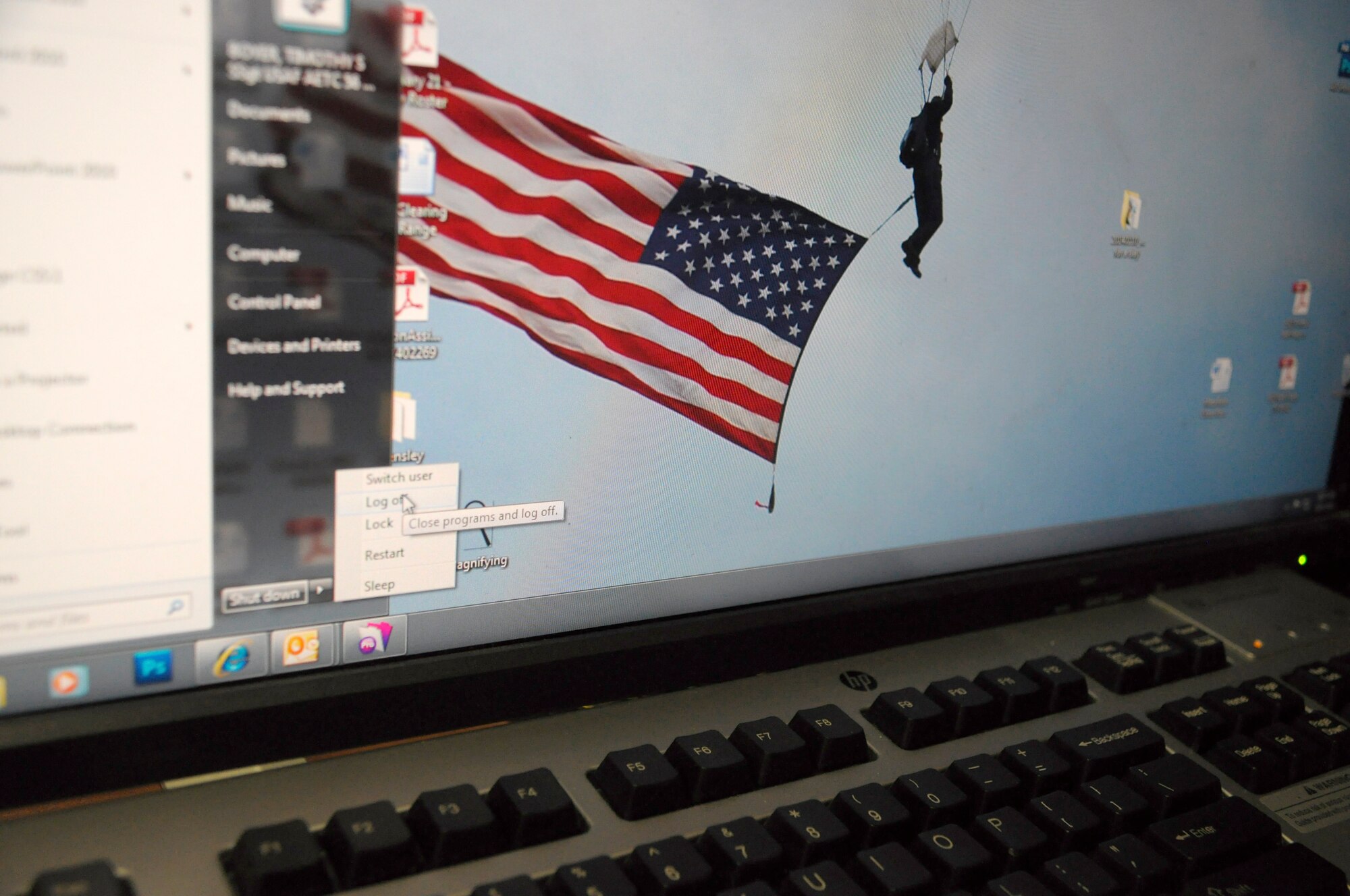 A service member logs off his computer Tuesday at Luke Air Force Base. Logging off your computer at the end of the day and leaving it powered on allows the 56th Communications Squadron Airmen to make updates that are vital to ensuring a healthy network and ultimately a passing score during the March 17 through 21 Command Cyber Readiness Inspection. (U.S. Air Force photo/Staff Sgt. Timothy Boyer)