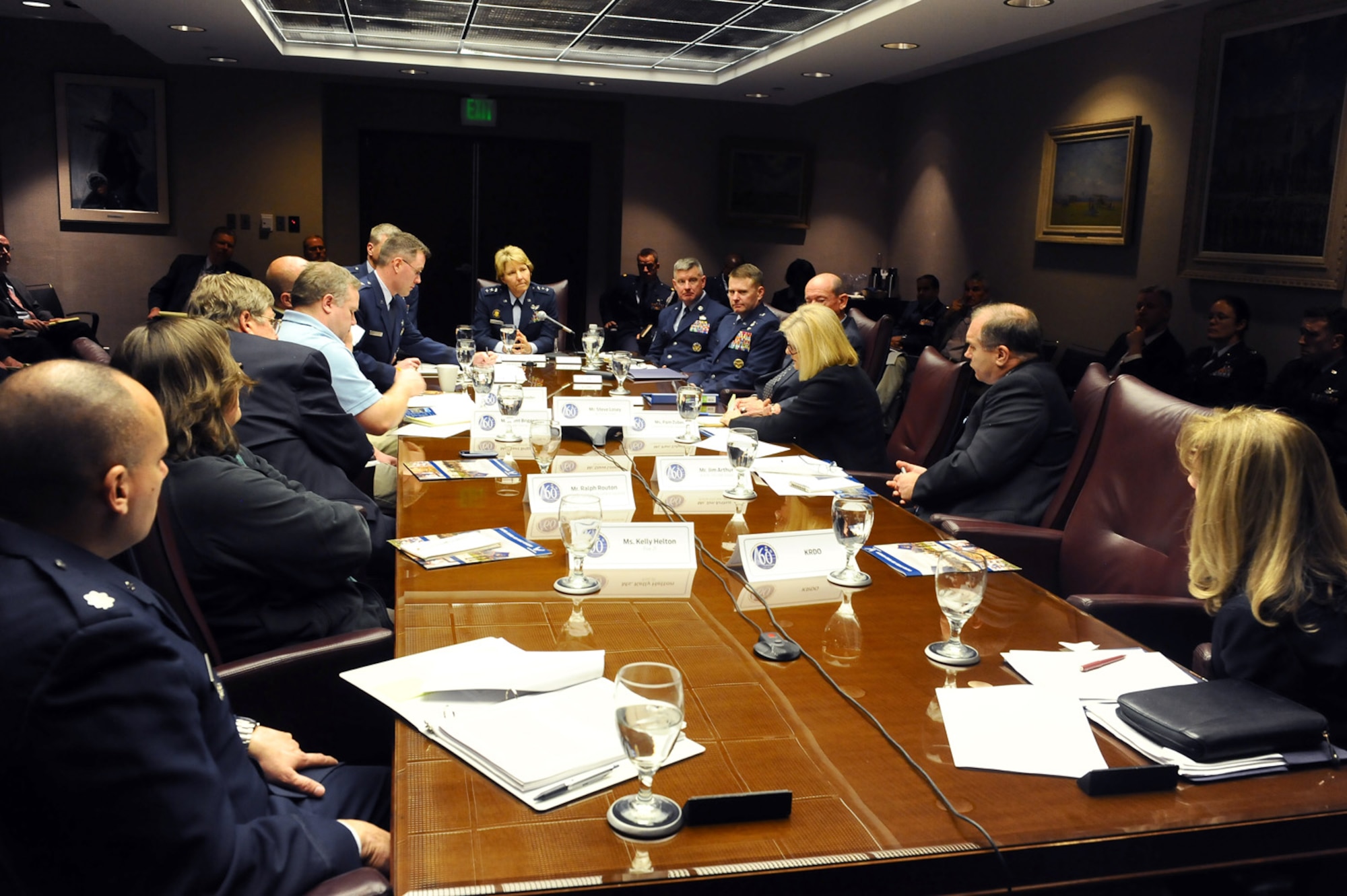 Academy Superintendent Lt. Gen. Michelle D. Johnson (center, back) and Academy senior leaders meet with media representatives from Colorado Springs and Air Force Times here March 3. The general made public the Academy's fiscal year 2015 budget impact March 4. (Master Sgt. Kenneth Bellard/Air Force photo)