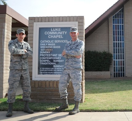 Staff Sgt.  Brandon Kenyon, 56th Fighter Wing chaplain assistant and Chaplain (Maj.) David Barns, 56th FW deputy chaplain, pose Tuesday in front of the Luke Community Chapel. Chaplain Barns leads the base chapel worship services and is actively involved in the chapel ministries programs. (U.S. Air Force photo/Staff Sgt. Luther Mitchell Jr.)