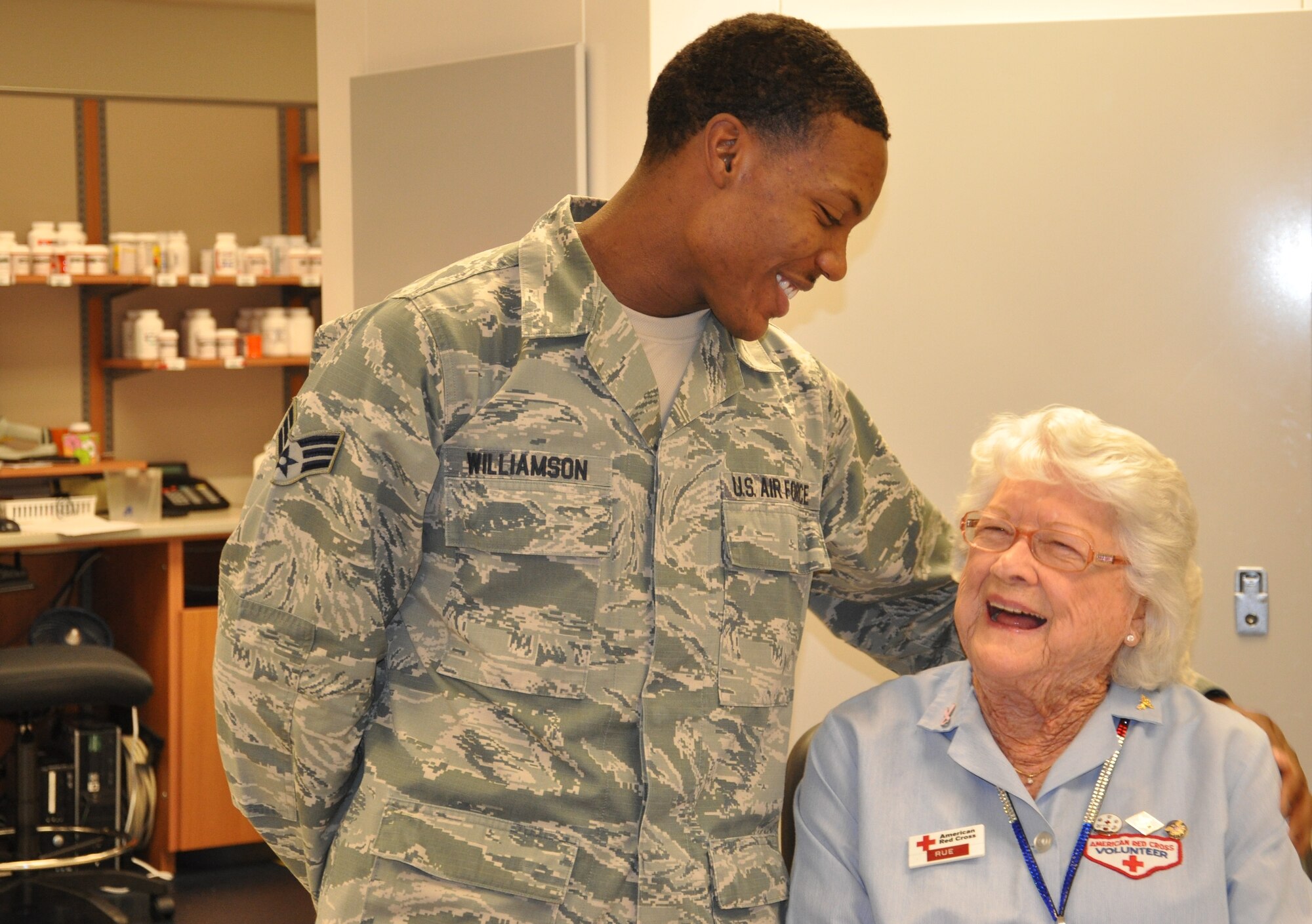 "Why do I volunteer? "It's simple really," said 92-year-old Rue King ."Like everyone else here, we all love giving back to people, and I love being around these great young people." Pictured with Rue is Senior Airman Travez D. Williamson, 45th Medical Group. (U.S. Air Force photo/Chris Calkins)

