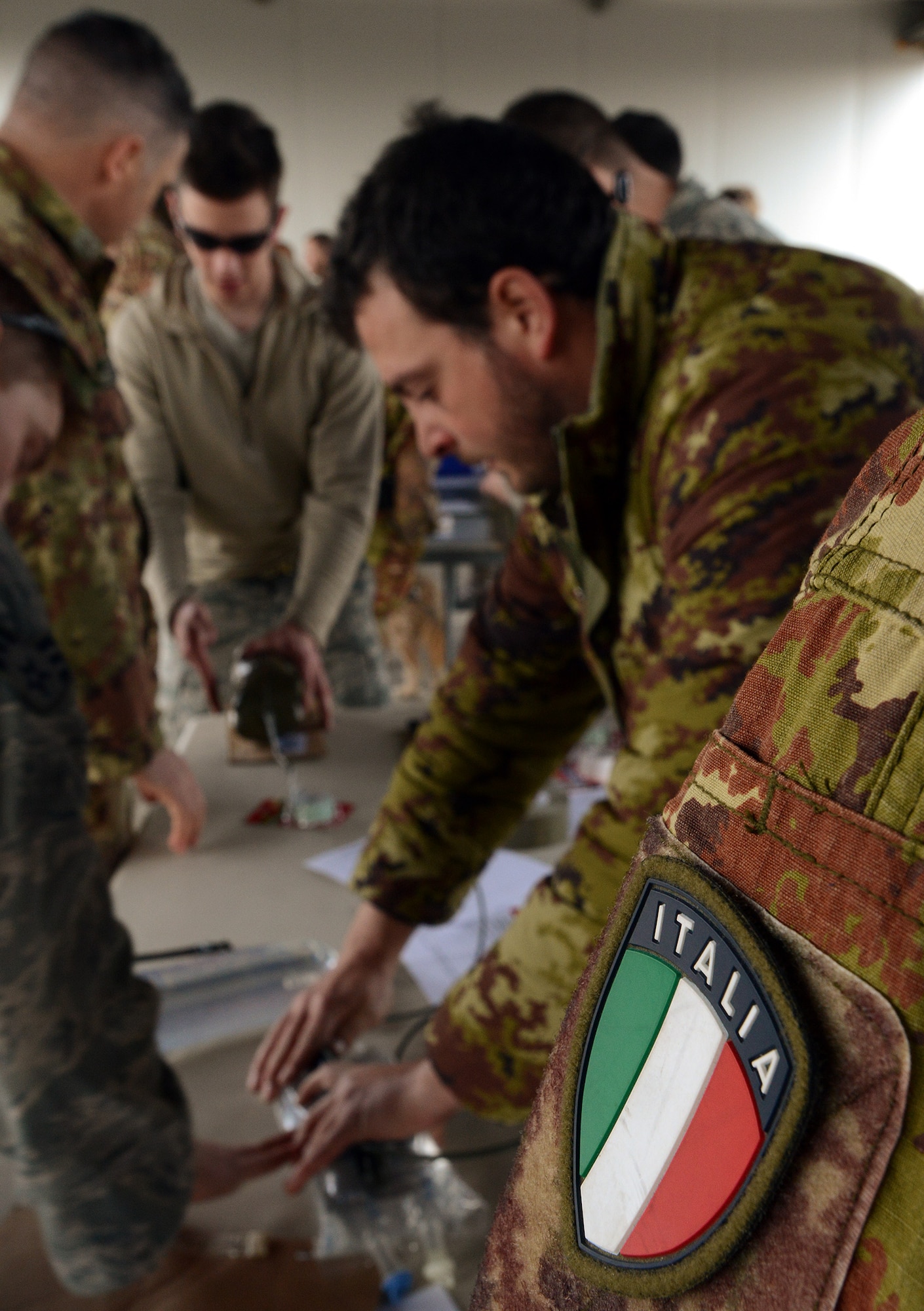 Italian army soldiers and 31st Civil Engineer Squadron explosive ordnance disposal technicians partner during dynamic entry training Feb. 26-27, 2014, at Aviano Air Base, Italy. The training allowed the service members to share best practices with one another. (U.S. Air Force photo/Staff Sgt. R.J. Biermann)