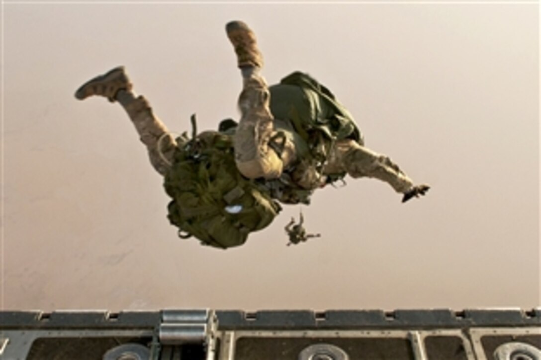 A U.S. airman exits an C-130 H3 aircraft during a high-altitude jump while participating in Joint Exercise Flintlock 2014 over northeastern Niger, Feb. 28, 2014.