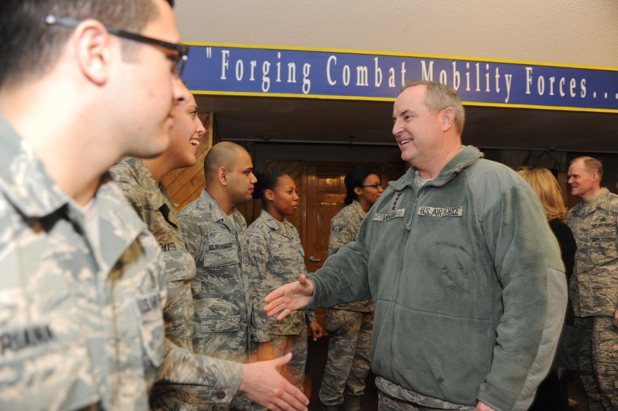 ALTUS AIR FORCE BASE, Okla. – Air Force Chief of Staff Gen. Mark A. Welsh III meets with Airmen of the 97th Medical Group during a base visit, Mar. 5, 2014. Welsh, Chief Master Sgt. of the Air Force James A. Cody, and their spouses, Betty and Athena, visited Altus to get a firsthand look at the wing’s mission and speak with Airmen and their families about opportunities and challenges they face. (U.S. Air Force photo by Senior Airman Jesse Lopez/Released)