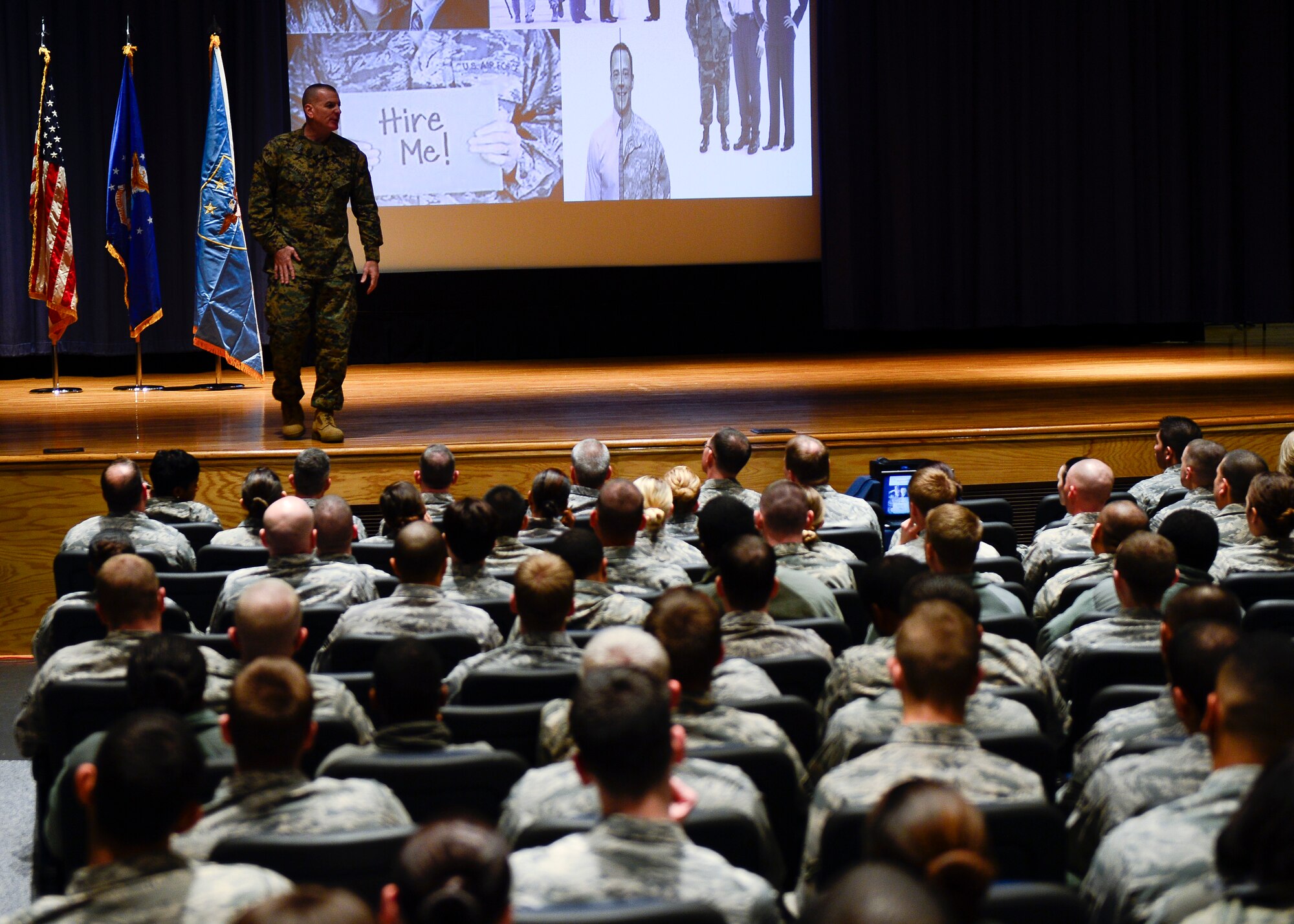 U.S. Marine Corps Sgt. Maj. Bryan Battaglia, Senior Enlisted Advisor to the Chairman of the Joint Chiefs of Staff, speaks with Airman during an enlisted all-call at Langley Air Force Base, Va., March 7, 2014. During the all-call Battaglia spoke on Joint Force 2020, activity duty to veteran transition, the Armed Forces noncommissioned officer Book, health and readiness. (U.S. Air Force photo by Staff Sgt. John D. Strong II/Released) 