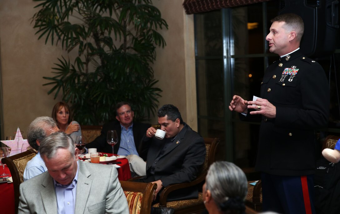 Lt. Col. Steven J. deLazaro, assistant chief of staff for Marine Corps Community Services, speaks during the American Friends of our Armed Forces Salute the Troops dinner at Toscana Country Club in Indian Wells, Calif., March 4, 2014. The best advice I ever got on public speaking is to be brief, be brilliant and be gone,” said deLazaro. “It is an honor to be a part of this dinner, and is always humbling to be recognized by others for our service.” (Official Marine Corps Photo By Lance Cpl. Kasey Peacock/Released)


