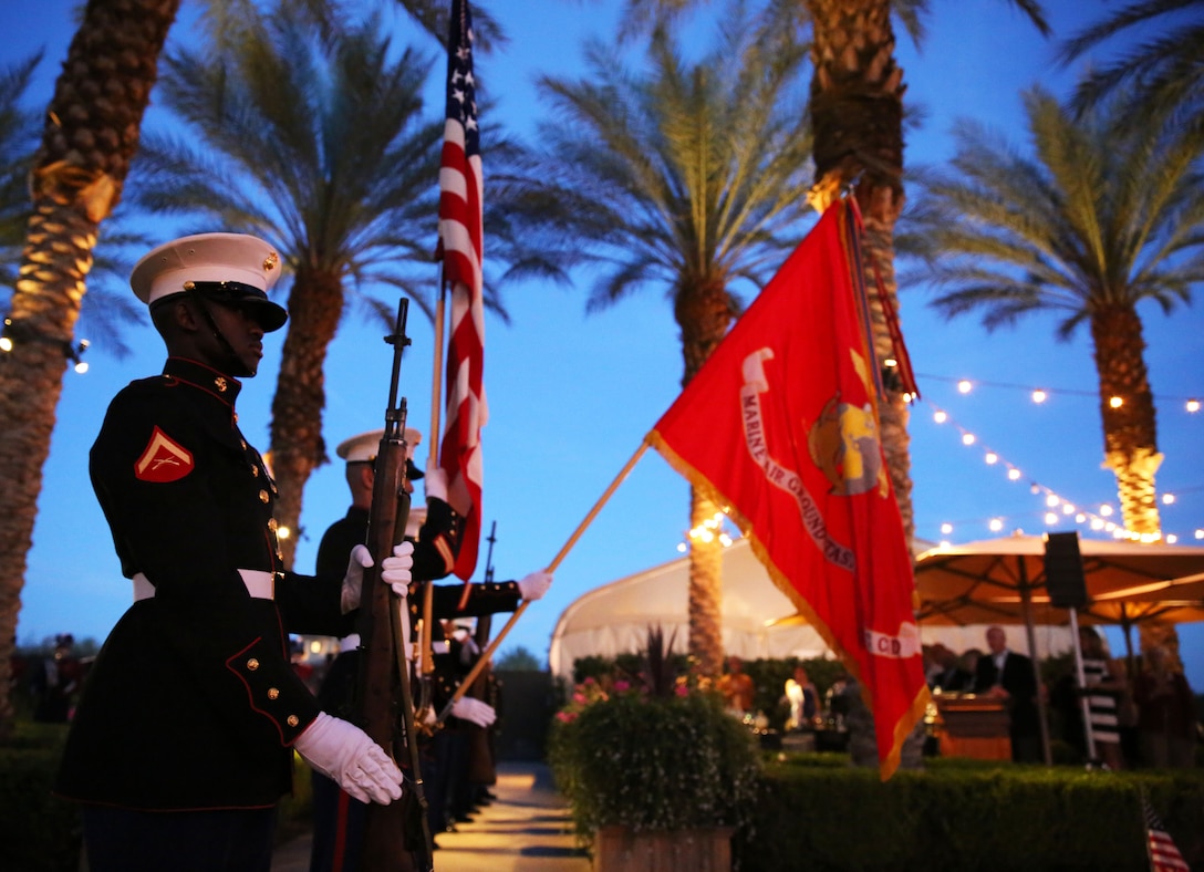 The Headquarters Battalion Color Guard presents the colors during the American Friends of our Armed Forces Salute the Troops dinner at Toscana Country Club in Indian Wells, Calif., March 4, 2014. The HQBN color guard has been present in approximately 79 events since August 2012. (Official Marine Corps Photo By Lance Cpl. Kasey Peacock/Released)


