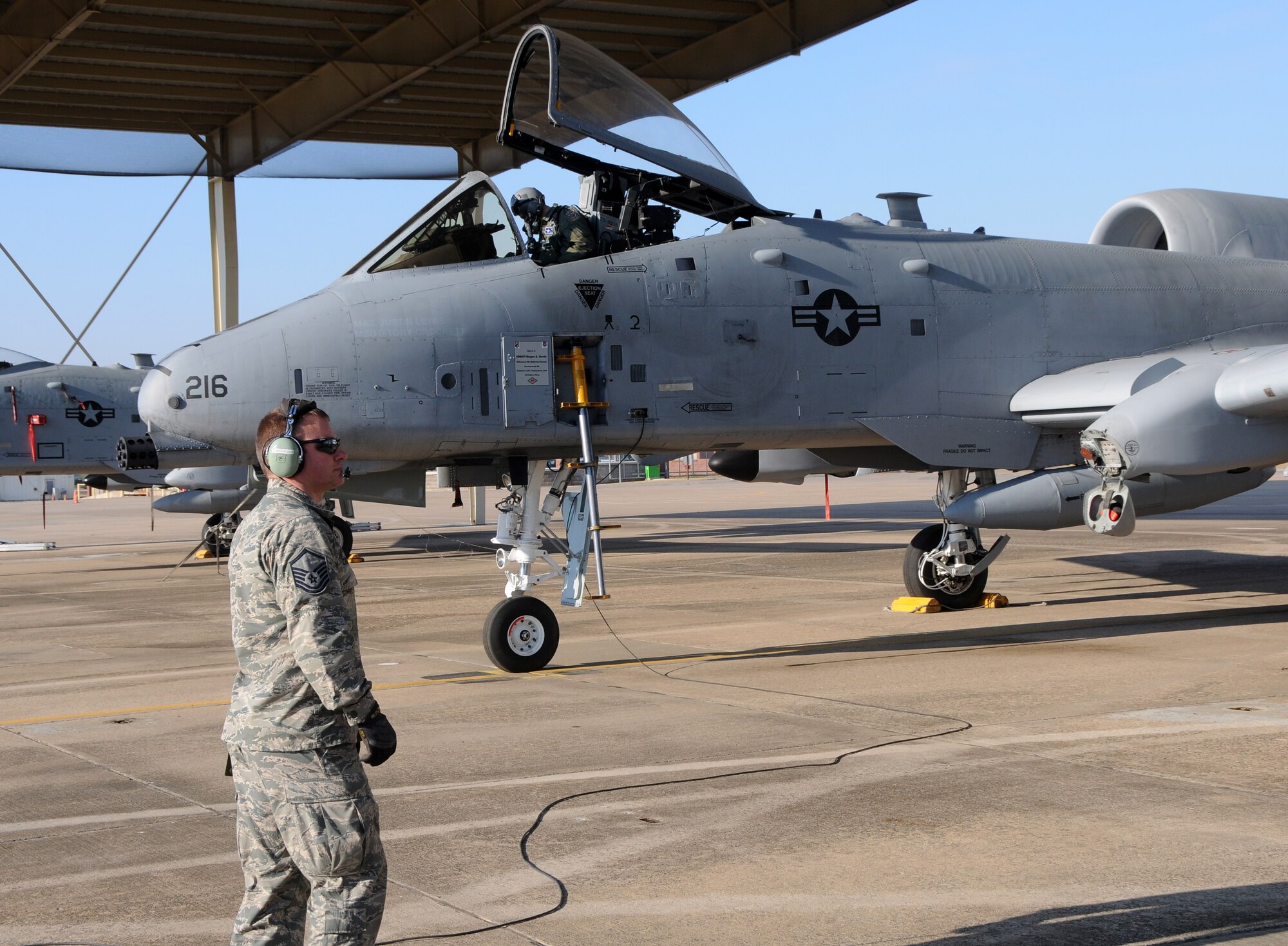 Master Sgt. Tony Crockett of the 188th Aircraft Maintenance Squadron and 1st Lt. Ellis Moser of the 74th Fighter Squadron conduct preflight inspections March 6, 2014. Moser delivered the A-10C Thunderbolt II “Warthog” (Tail No. 216) to Moody Air Force Base, Ga., as part of the 188th Fighter Wing’s conversion from the A-10 to a remotely piloted aircraft, intelligence and targeting mission. The 188th has six remaining A-10s on station. (U.S. Air National Guard photo by Senior Airman John Hillier/released)