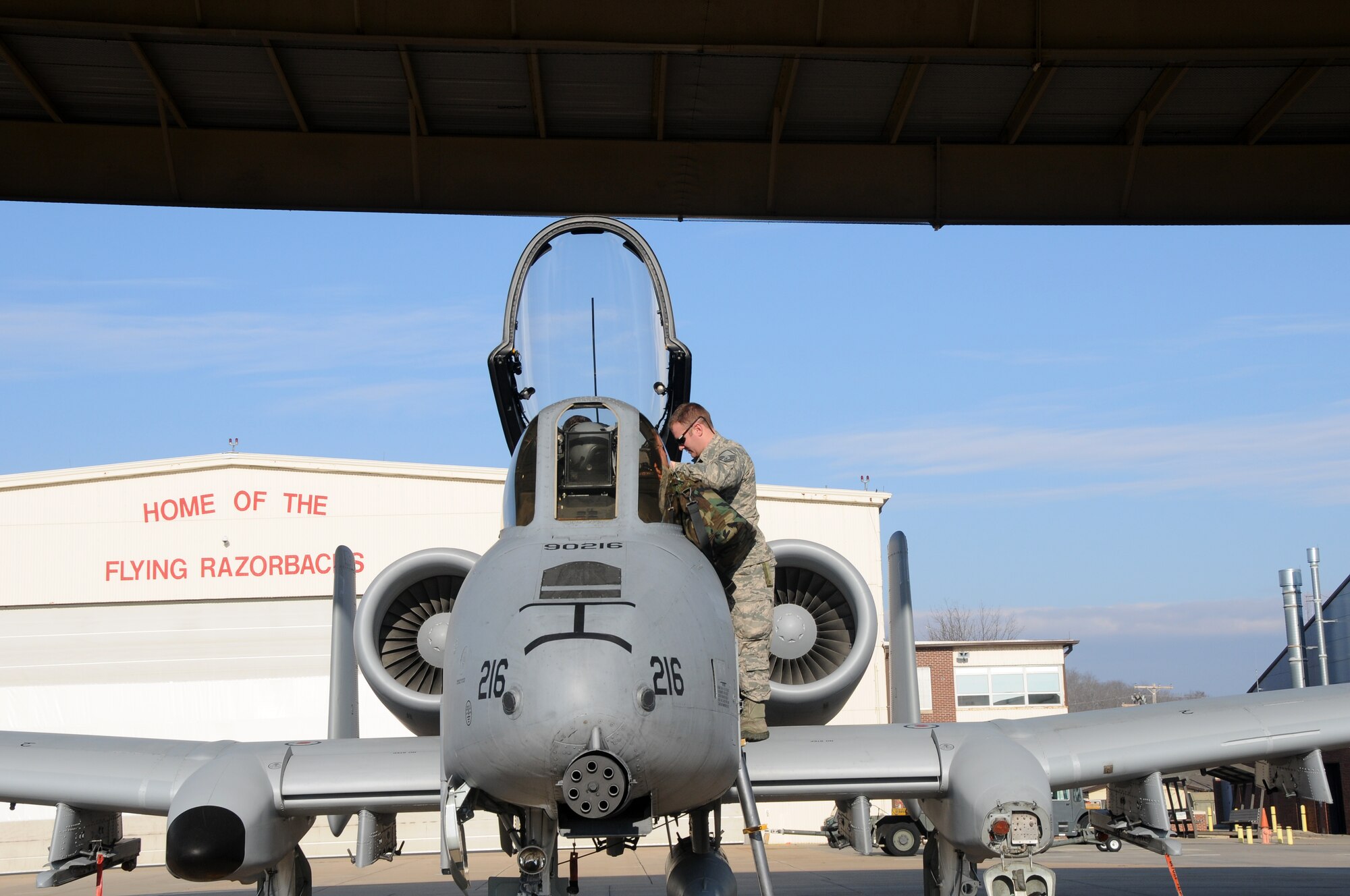Master Sgt. Tony Crockett of the 188th Aircraft Maintenance Squadron and 1st Lt. Ellis Moser of the 74th Fighter Squadron conduct preflight inspections March 6, 2014. Moser delivered the A-10C Thunderbolt II “Warthog” (Tail No. 216) to Moody Air Force Base, Ga., as part of the 188th Fighter Wing’s conversion from the A-10 to a remotely piloted aircraft, intelligence and targeting mission. The 188th has six remaining A-10s on station. (U.S. Air National Guard photo by Senior Airman John Hillier/released)