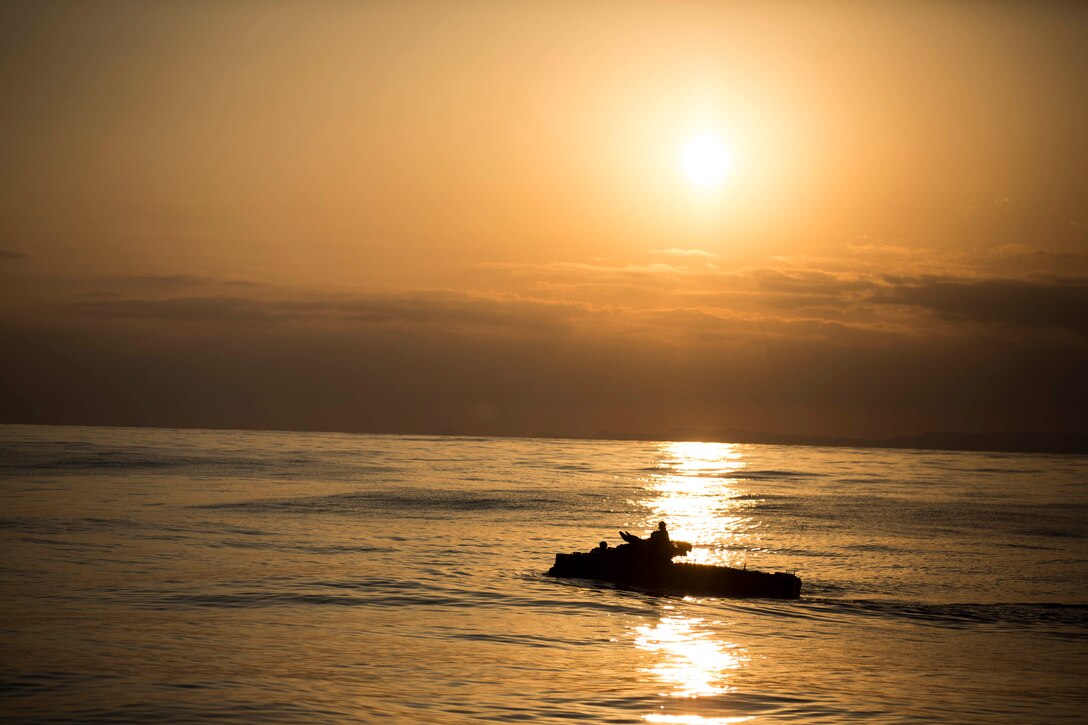 An Amphibious assault vehicle with Battalion Landing Team 2nd Battalion, 5th Marines, 31st Marine Expeditionary Unit, maneuvers through the water during a splash and recovery exercise, Feb. 28. The 31st MEU recently embarked upon the three ships of the USS Bonhomme Richard (LHD-6) Amphibious Ready Group for the regularly-scheduled Spring Patrol. The 31st MEU is the Marine Corps’ force of choice for the Asia-Pacific region and is the only continuously forward-deployed MEU. 