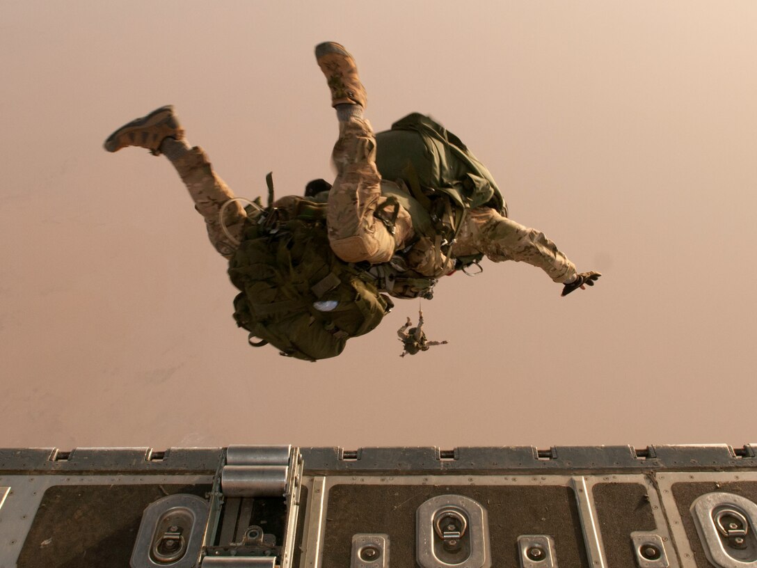 A combat controller team from the 720th Special Tactics Group exits a C-130 Hercules during a high-altitude, high-opening jump during Joint Exercise Flintlock Feb. 28, 2014, over northeastern Niger. Flintlock is an annual, African-led, military exercise focused on security, counter-terrorism and military humanitarian support to outlying areas hosted each year by a different government in western Africa. (U.S. Air National Guard photo/Tech. Sgt. Eugene Crist)