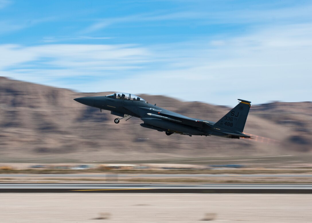 An F-15E Strike Eagle assigned to the 336th Fighter Squadron takes off during Red Flag 14-2 March 4, 2014, at Nellis AFB, Nev. Red Flag gives Airmen an opportunity to experience realistic combat scenarios, and prepares them for future real-world operations. (U.S. Air Force photo/Airman 1st Class Thomas Spangler)