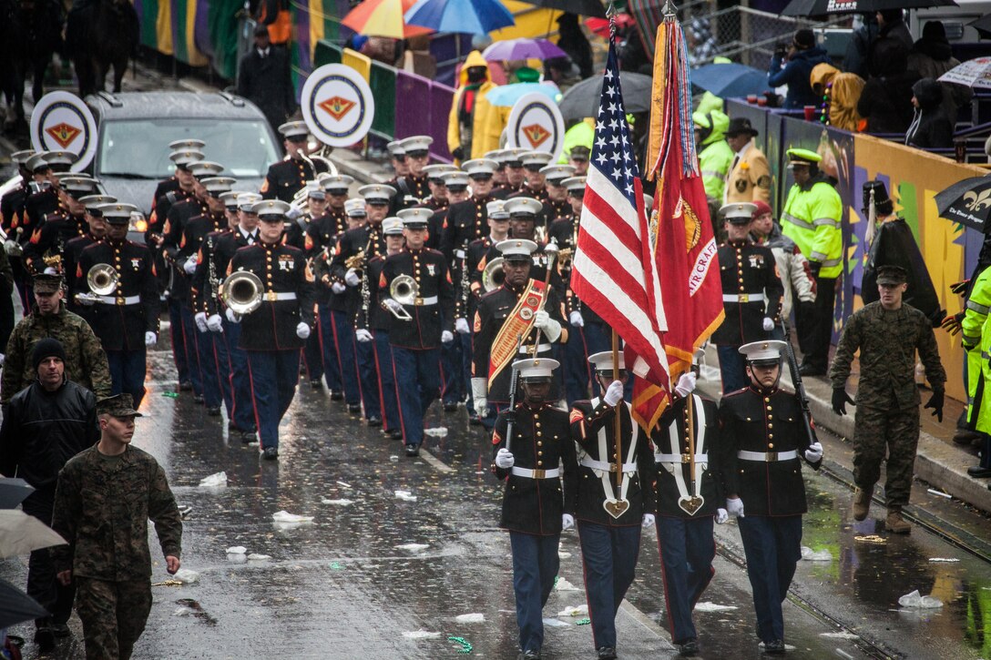 The 2nd Marine Corps Aircraft Wing band marches in the Zulu parade during Mardi Gras in New Orleans, March 4, 2014.  The armed forces community had the opportunity to participate in the 2014 Mardi Gras festivities  to highlight the military presence in the New Orleans area and support community outreach events. (U.S. Marine Corps photo by Cpl. Bobby J. Gonzalez/Released)