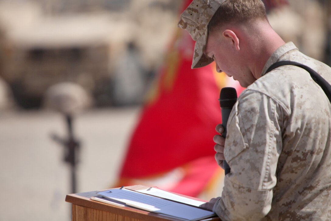 Lance Cpl. Zachary Dewar, with 1st Battalion, 9th Marine Regiment, speaks during the memorial service of his brother-in-arms, Lance Cpl. Caleb L. Erickson, aboard Camp Leatherneck, Afghanistan, March 7. Erickson, of Waseca, Minn., a motor transportation mechanic stationed out of Camp Lejeune, N.C., died while conducting combat operations in Helmand province, Afghanistan, Feb. 28, 2014.