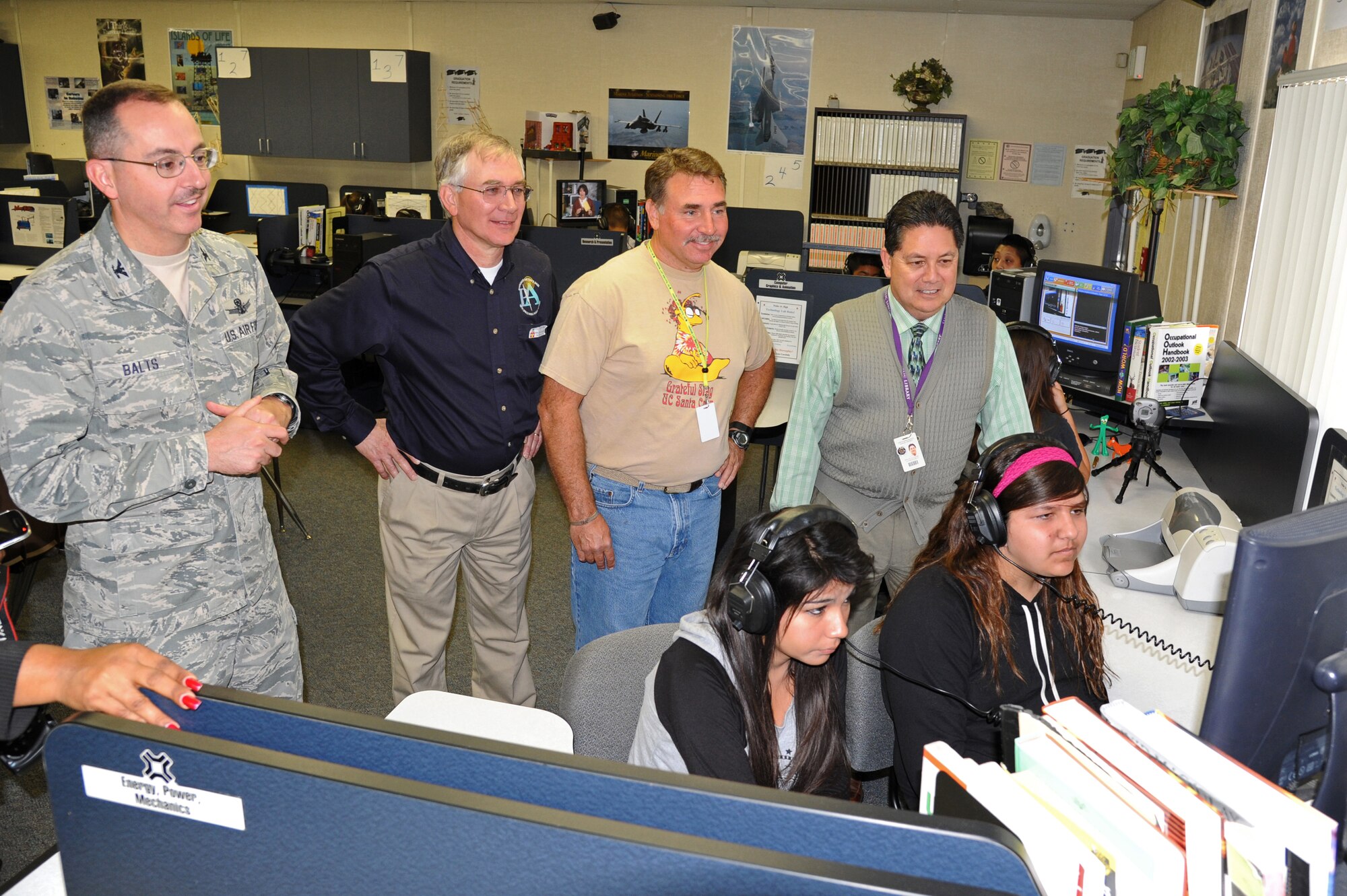 SANTA MARIA, Ca. -- Col Keith Balts, 30th Space Wing commander, Steve Heuring, donation lead, Rob Bergan, Fesler Junior High School assistant principal, and Phil Alvarado, superintendent at Santa Maria Bonita School District, tour the Industrial Tech Lab at Fesler Junior High School Friday, Friday Mar. 7. The 30th Space Wing recently donated excess computers through the “Computer for learning” program to support the school’s lab. (Contributed Photo/Mark Mackley)