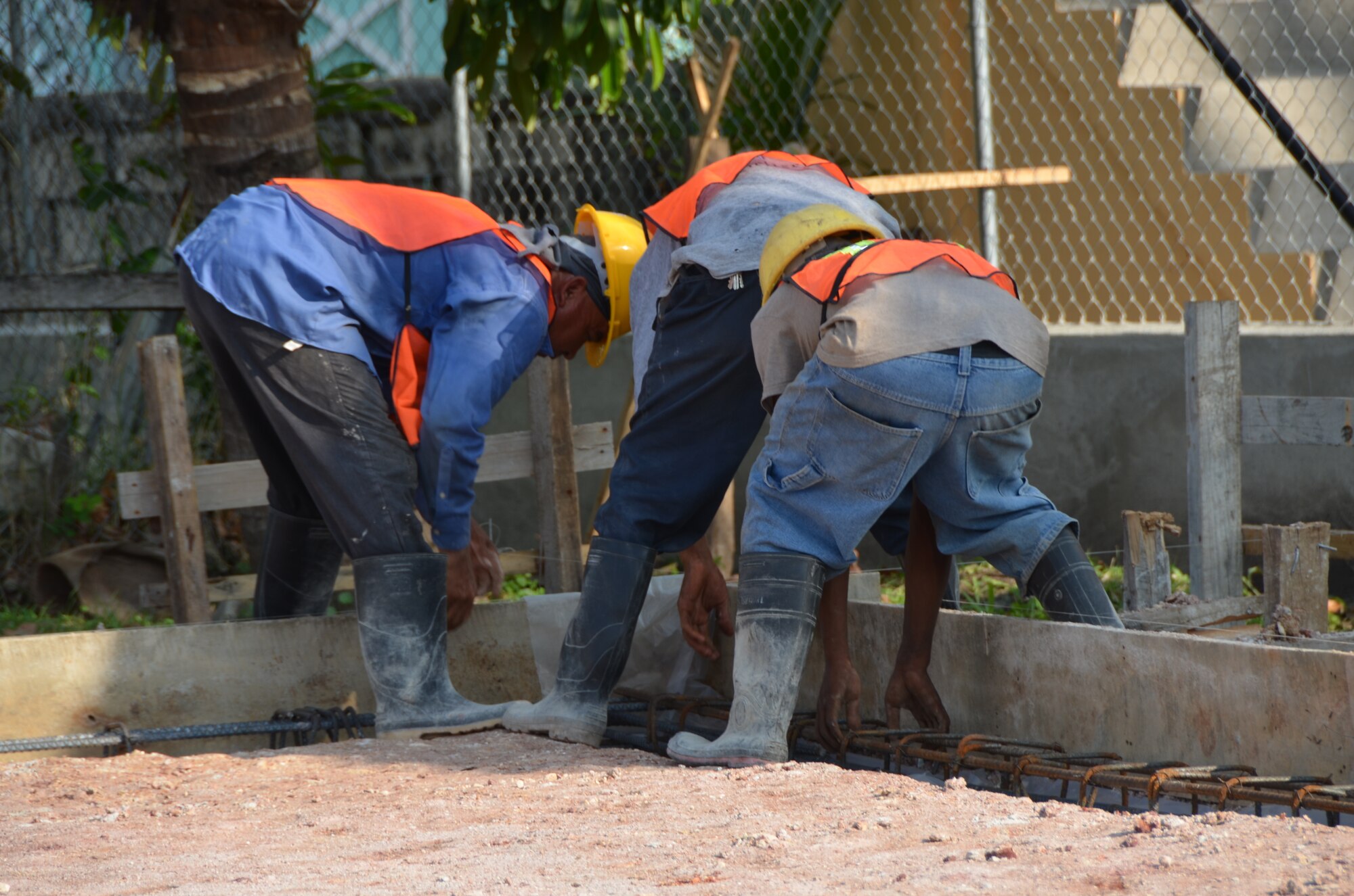 Belizean contractors prepare to level a concrete slab at the Stella Maris School for children with disabilities in Belize City, March 7. New Horizons engineering personnel and members of the Belize Defence Force will be adding an addition to this school after the exercise kicks off April 2. Civil engineers from both the U.S. and Belize will construct three schools in Belize City and one school in Hattieville. The schools will support furthering the education of children in the country. (USAF photo by Master Sgt. Kelly Ogden/Released)








