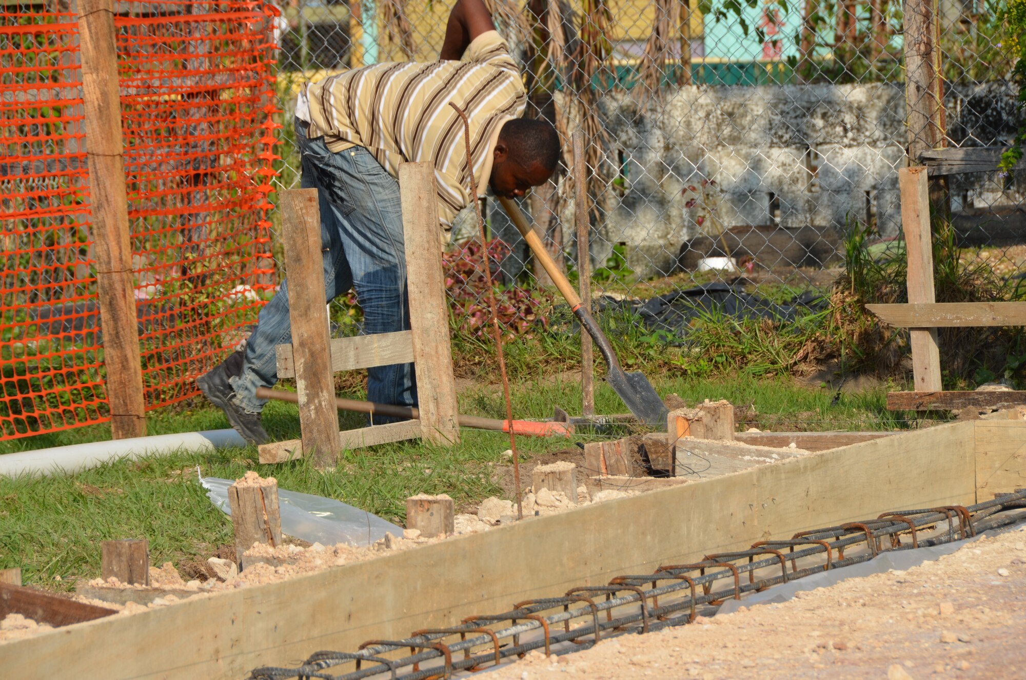 Belizean contractors prepare to level a concrete slab at the Stella Maris School for children with disabilities in Belize City, March 7. New Horizons engineering personnel and members of the Belize Defence Force will be adding an addition to this school after the exercise kicks off April 2. Civil engineers from both the U.S. and Belize will construct three schools in Belize City and one school in Hattieville. The schools will support furthering the education of children in the country. (USAF photo by Master Sgt. Kelly Ogden/Released)






