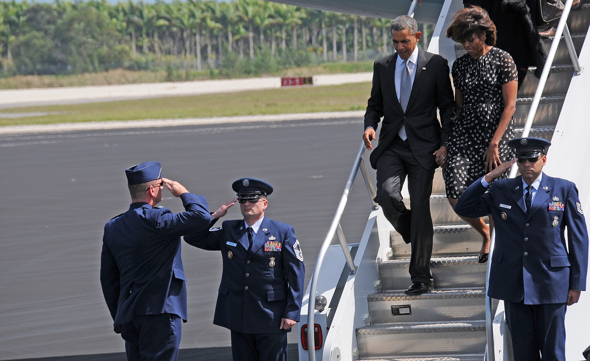 Col. Christian Funk, Commander, 482nd Fighter Wing, welcomes President Obama and the first lady at Homestead Air Reserve Base Fla., on March 7.  The Obama’s made a brief stop at Homestead ARB prior to departing for Coral Reef High School in Miami, Fla. (U.S. Air Force photo/Tim Norton)