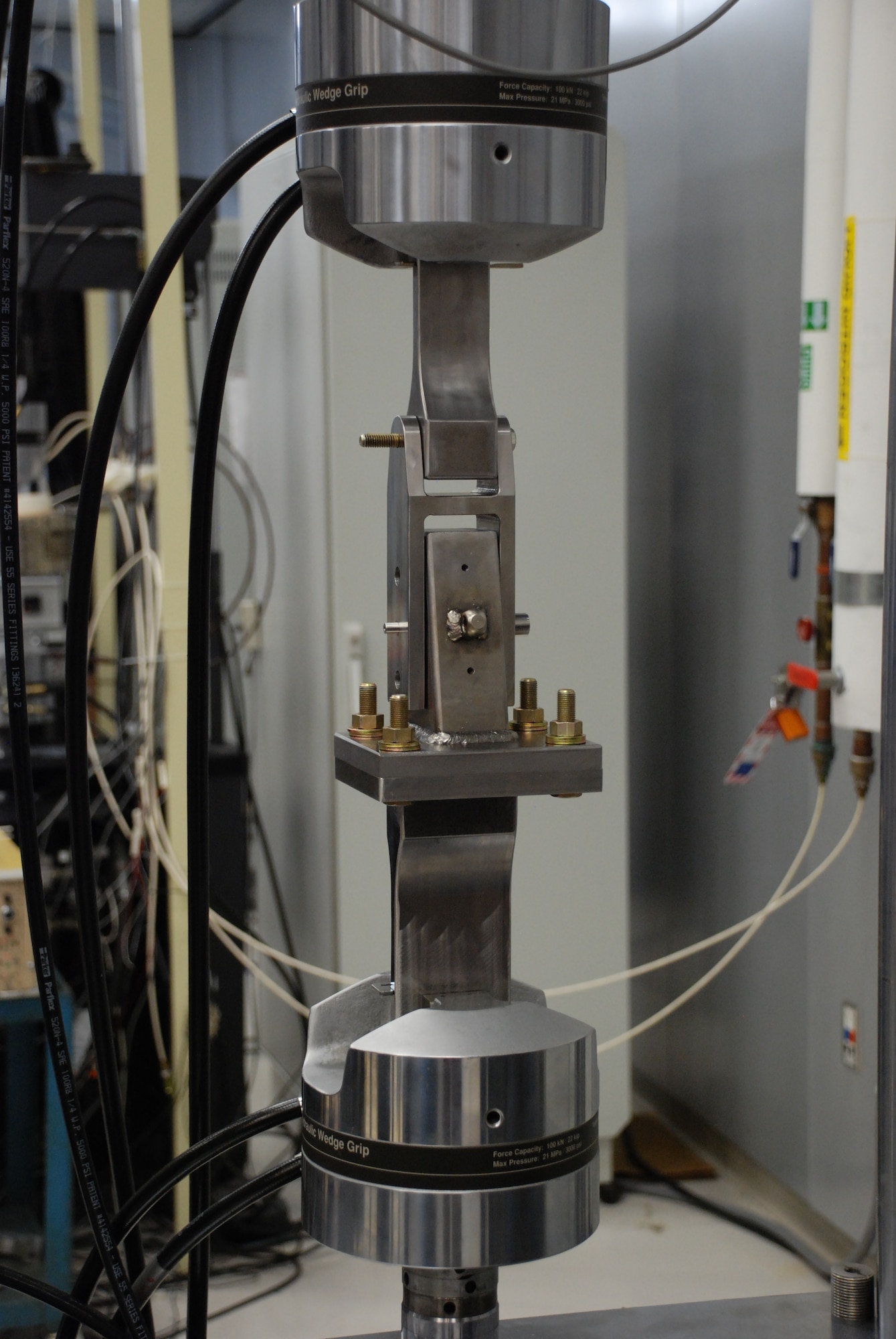 AFRL researchers contributed to a new, safer design for the RQ-4B Global Hawk tow-bar adapter. (AFRL Image)