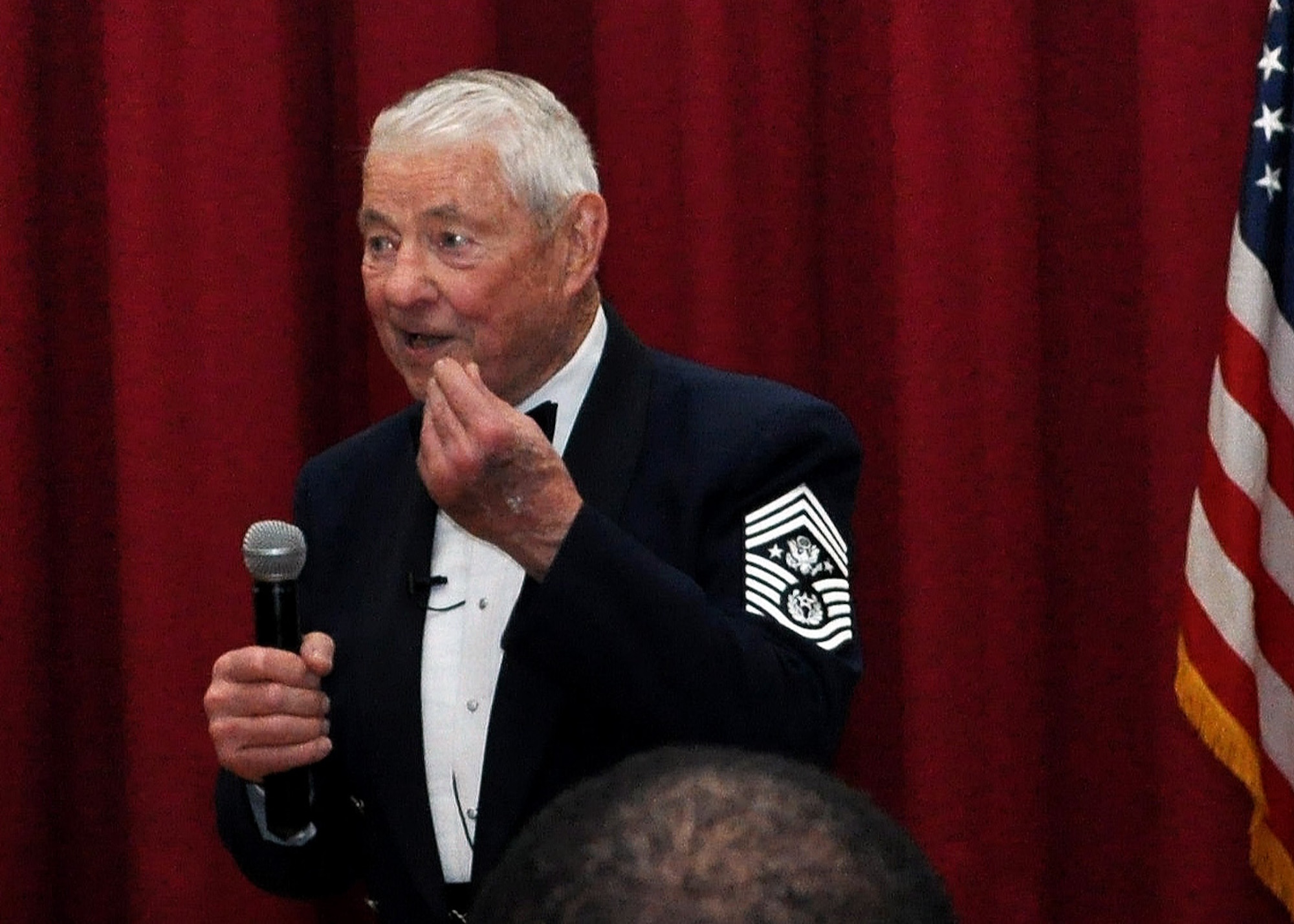 Retired Chief Master Sgt. Of the Air Force Robert D. Gaylor speaks at the 59th Medical Wing’s Annual Awards Banquet Feb. 28, 2014, at the Gateway Club, Joint Base San Antonio-Lackland, Texas. As the event’s keynote speaker, Gaylor highlighted several keys to success – attitude, education and hard work. (U.S Air Force photo/Senior Airman Lynsie Nichols)