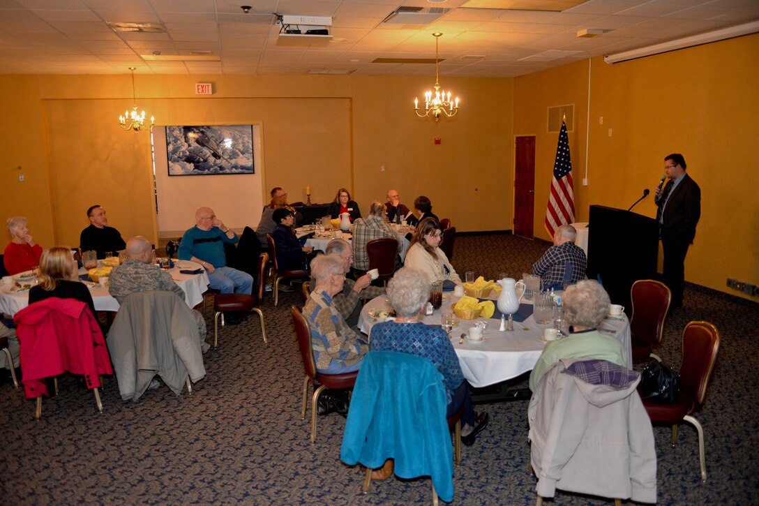 Darrell Shoemaker, representing Senator Tim Johnson, speaks with military retirees during a luncheon in the Dakota’s Club at Ellsworth Air Force Base, S.D., March 4, 2014. The event provided attendees with the latest information on benefits and programs available to retirees and their families. (U.S. Air Force photo by Senior Airman Zachary Hada/Released)