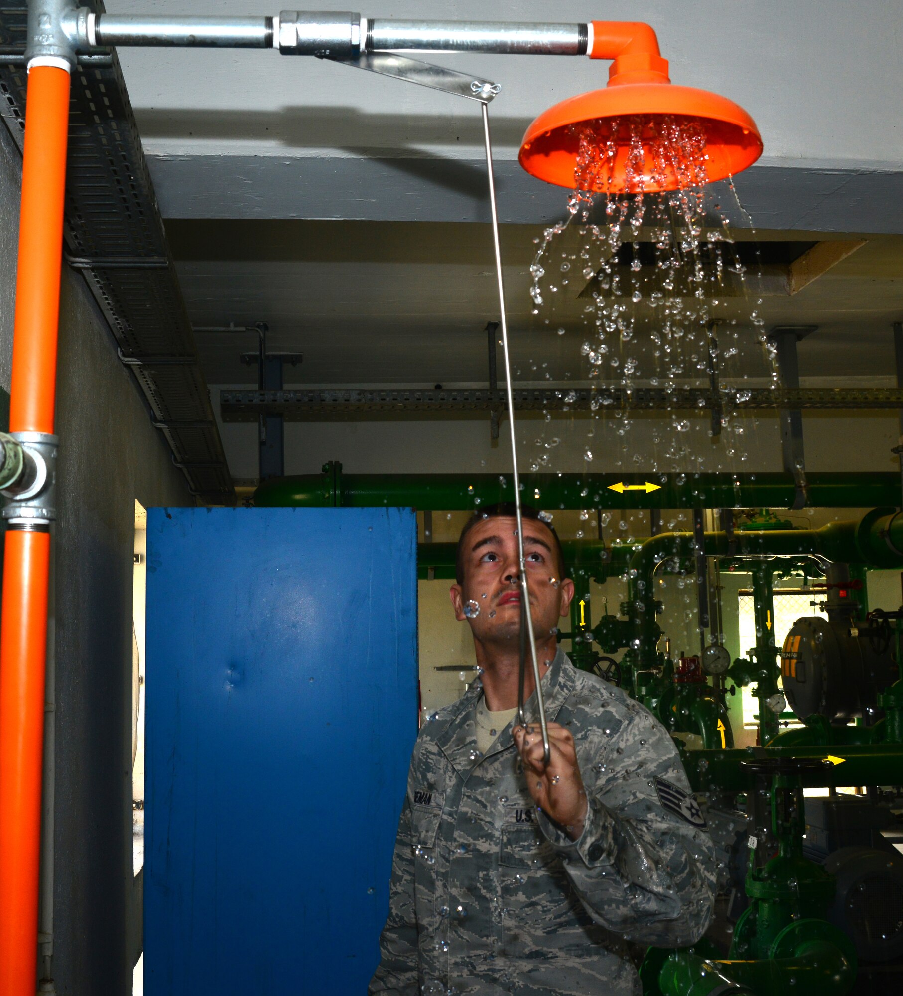 Staff Sgt. Timothy Wiseman, 39th Logistics Readiness Squadron petroleum, oil and lubricants flight, releases water to test a safety system in the hydrants building March 6, 2014, Incirlik Air Base, Turkey. The Airmen of POL ensure mission readiness at all times by maintaining their own equipment and providing clean fuel by testing and sampling. (U.S. Air Force photo by Staff Sgt. Eric Summers Jr./Released)