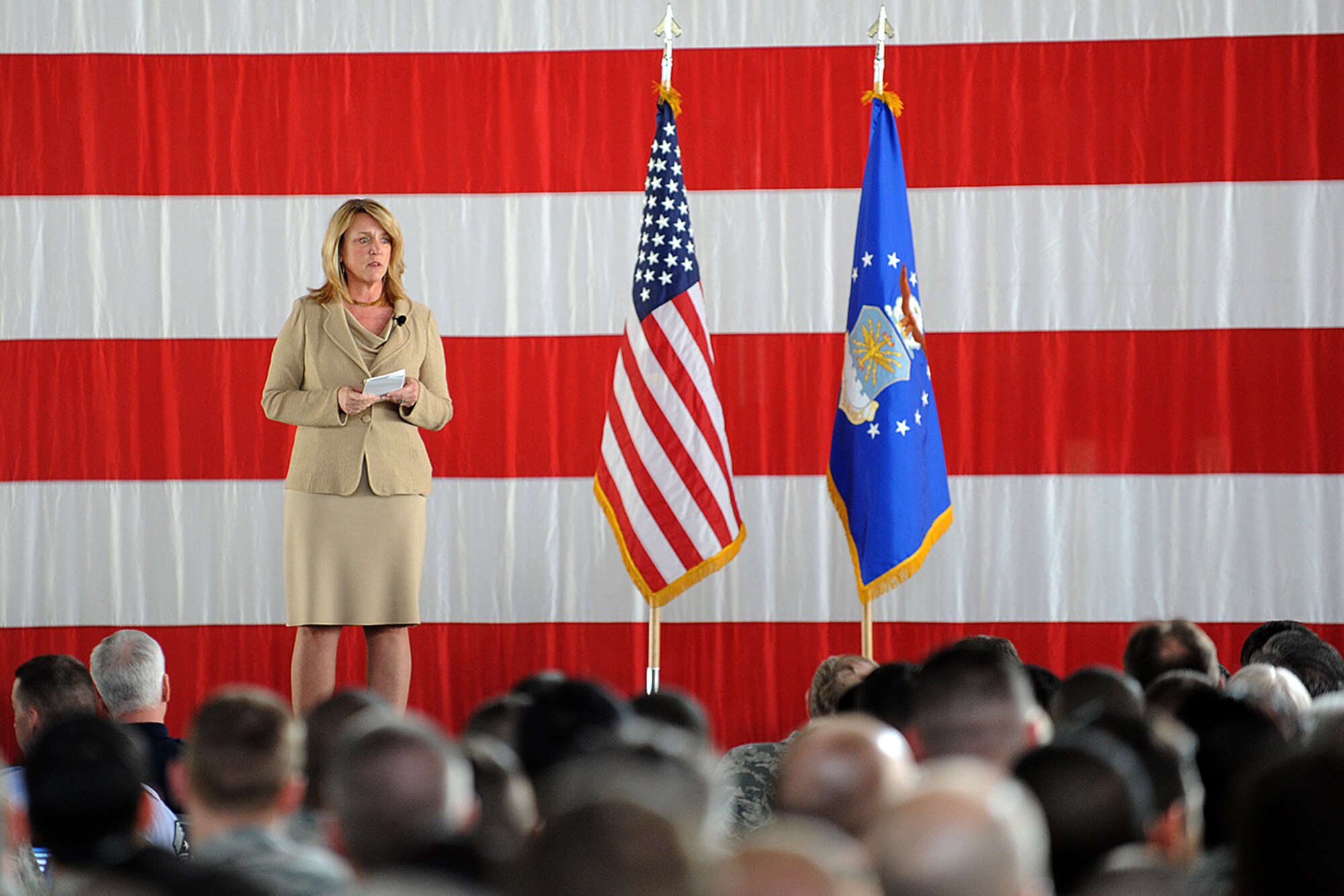PETERSON AIR FORCE BASE, Colo. -- Secretary of the Air Force Deborah Lee James listens to a question posed by a member of the 21st Space Wing during an all-call held during her recent visit here March 6. James discussed the path she and other defense leaders want to pursue moving forward. (U.S. Air Force photo/Rob Bussard)