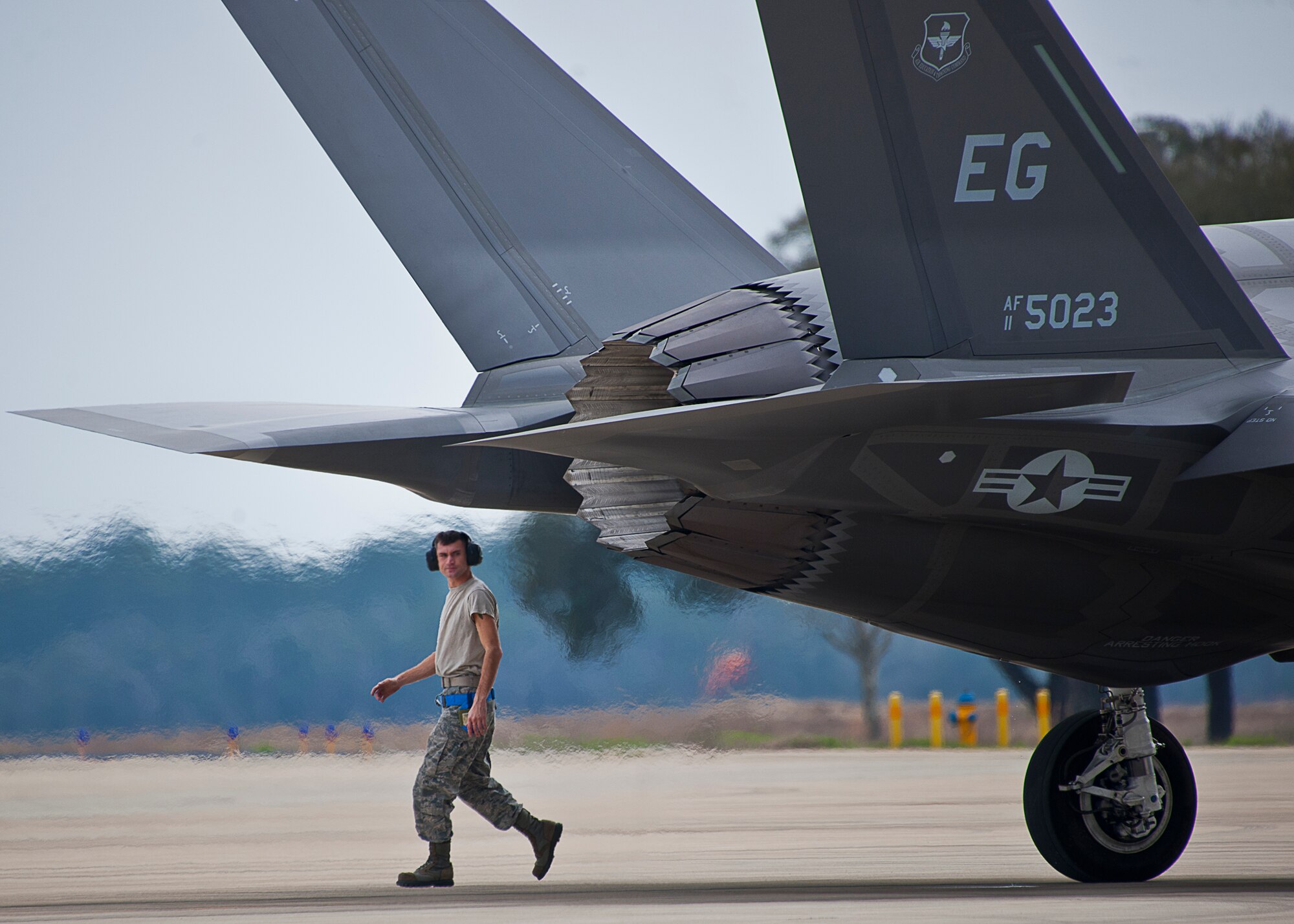 A 33rd Fighter Wing maintainer performs post flight checks on an F-35A Lightning II after a sortie at Eglin Air Force Base, Fla. (U.S. Air Force photo/Samuel King Jr.)