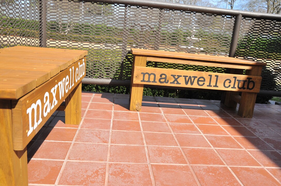 The woodworkers also built the two benches that sit outside the
club's lounge. (U.S. Air Force photo by Phil Berube)