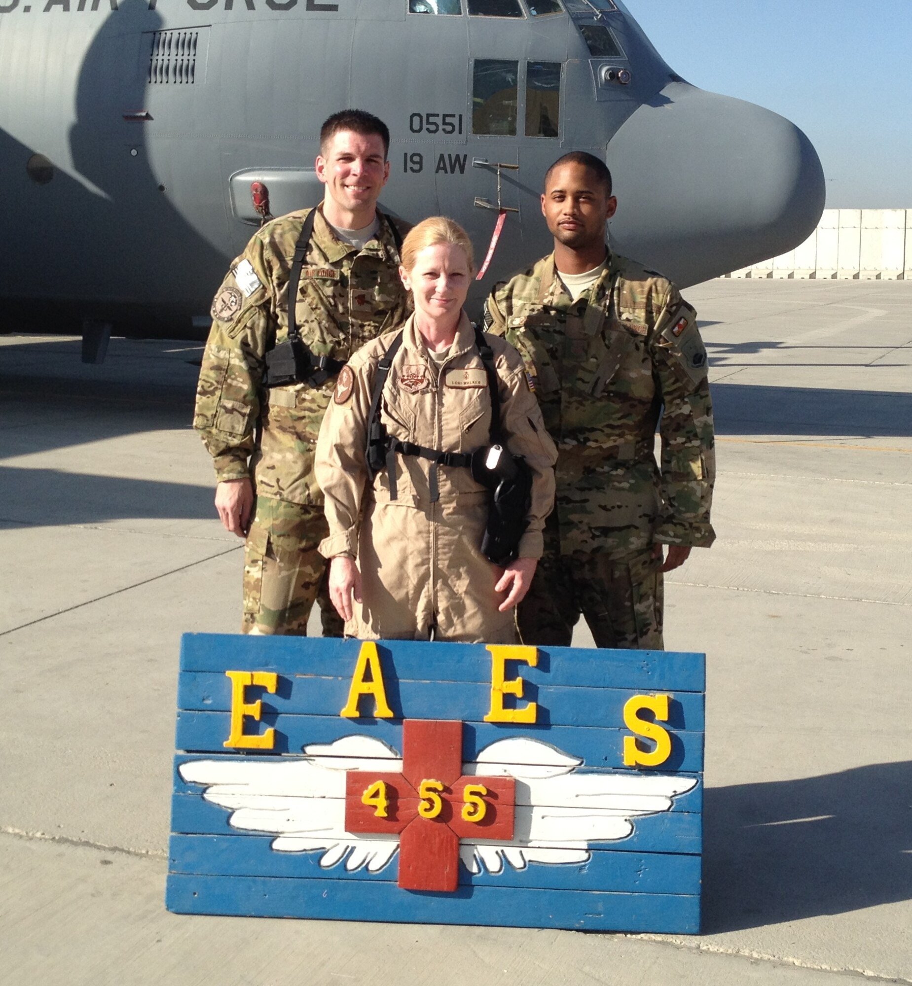 Maj. Christopher Bates (left), 60th Medical Group, poses for a group photo with members of his Critical Care Air Transport, or CCAT, team during a deployment to Afghanistan in 2012.  (Courtesy photo)