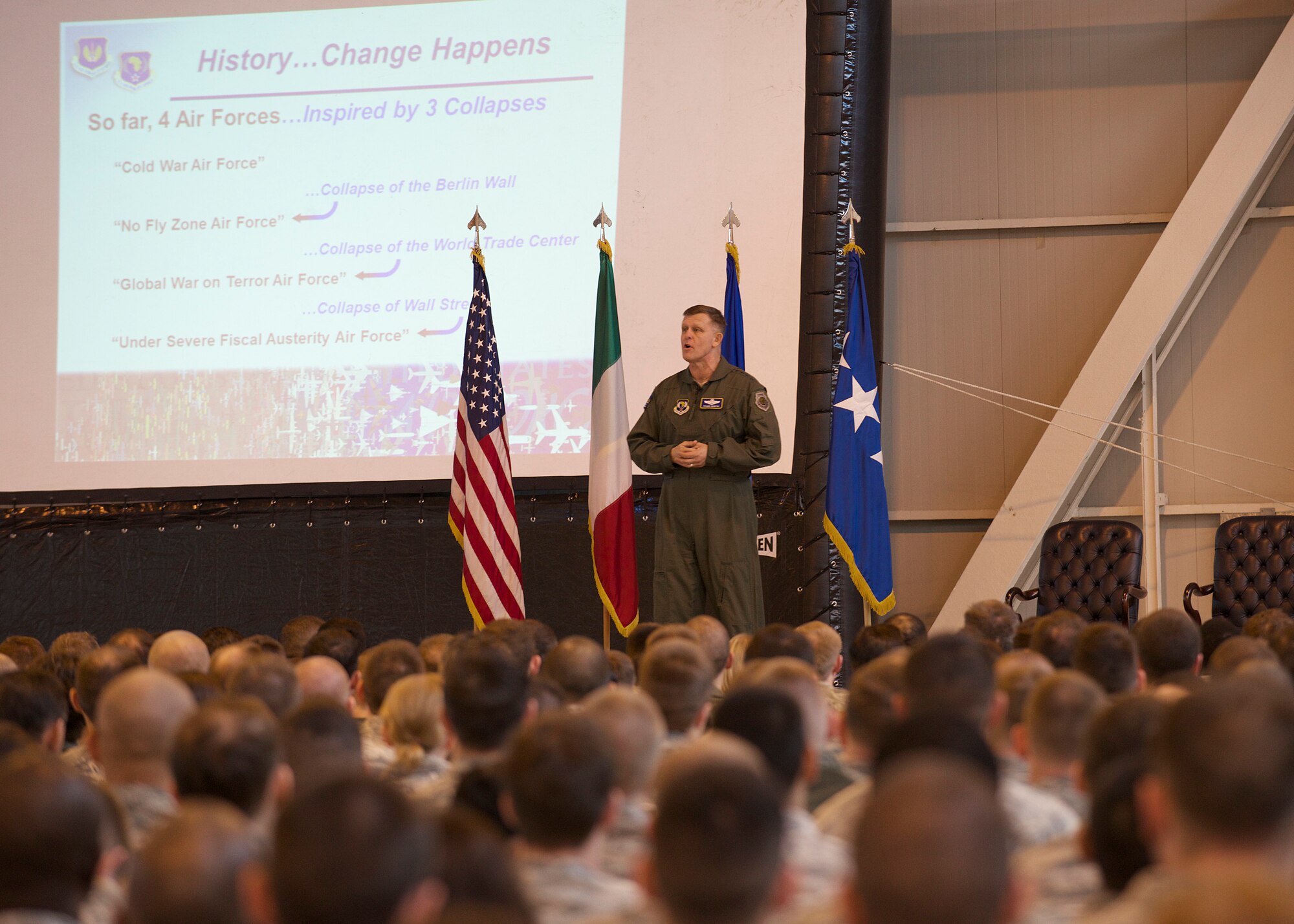 Gen. Frank Gorenc, U.S. Air Forces in Europe, Air Forces Africa commander, talks to 31st Fighter Wing Airmen during an All-Call, March 5, 2014, at Aviano Air Base, Italy. During the visit, Gorenc met with base officials as well as various Airmen and civilians to answer questions and share thoughts on current programs and initiatives. (U.S. Air Force photo/Airman 1st Class Ryan Conroy)