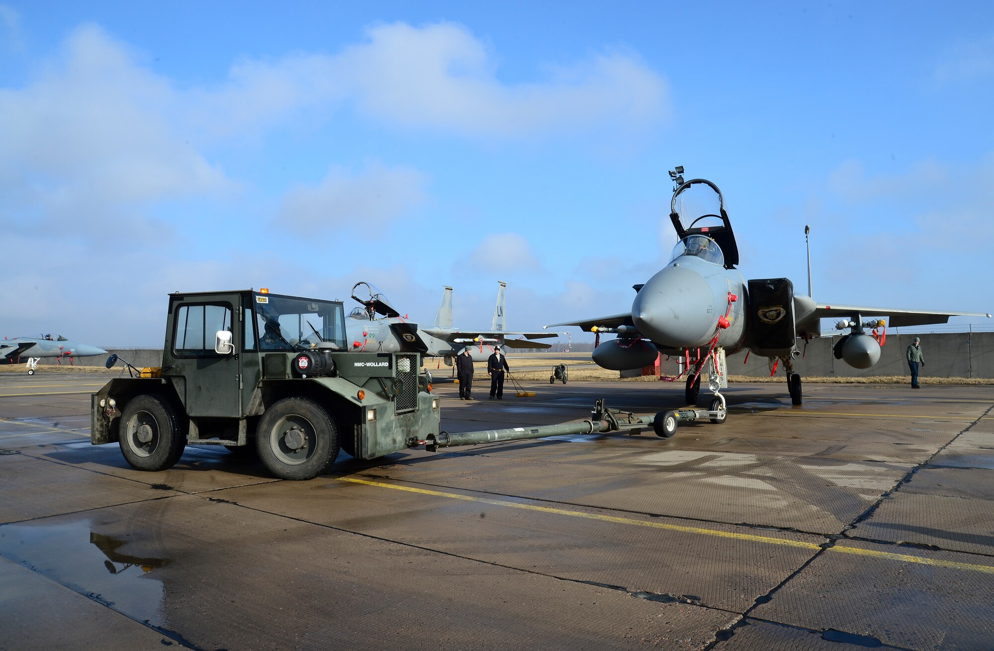 Airmen and aircraft from the 48th Air Expeditionary Group maintain a U.S. Air Force presence at Siauliai Air Base, Lithuania, March 7, 2014. The 48th Fighter Wing at Royal Air Force Lakenheath, England, sent an additional six aircraft and more than 50 personnel, to augment the four aircraft and approximately 150 Airmen already supporting NATO's ongoing air policing mission since January 2014, at the request of U.S. allies in the Baltics. (U.S. Air Force photo by Airman 1st Class Dana J. Butler/Released by Tech. Sgt. Sanjay Allen, U.S. European Command Media Operations)
