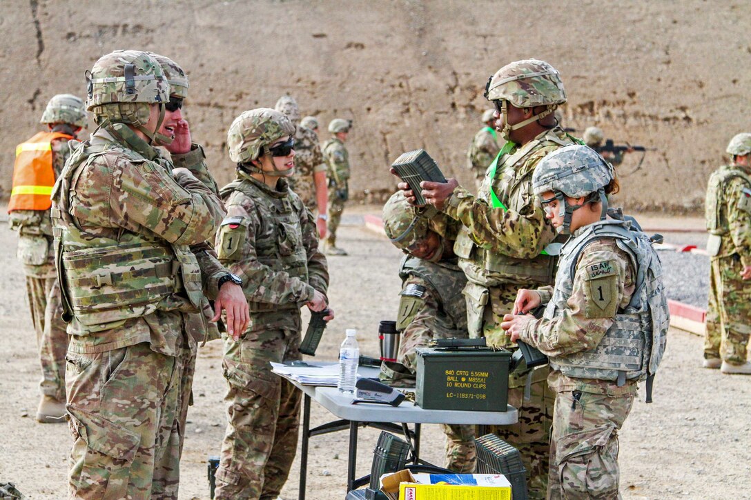 U.S. Army Spc. Amanda Luna, third from left, and other U.S. soldiers ...