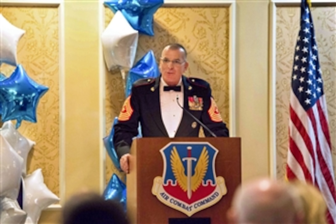 Marine Corps Sgt. Maj. Bryan B. Battaglia, senior enlisted advisor to the chairman of the Joint Chiefs of Staff, delivers remarks during the Air Combat Command's annual awards dinner on Joint Base Langley–Eustis, Va., March 7, 2014.