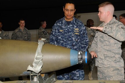 WHITEMAN AIR FORCE BASE, Mo. (March 10, 2014) Airman 1st Class James Thorne, 509th Munitions Squadron conventional maintenance crew member, explains the specifics of a 2,000-pound GBU-31 joint direct attack munition to Adm. Cecil D. Haney, Commander, U.S. Strategic Command (USSTRATCOM) during Haney's visit to Whiteman Air Force Base. Haney asked the Airmen about their concerns and ideas for improving working and living conditions and stressed the importance of their contributions to our nation's nuclear deterrence mission. The 509th Bomb Wing supports USSTRATCOM's strategic deterrence mission by operating and maintaining B-2 Spirit bombers to deter strategic threats from adversaries and assure our allies of our commitment to their security. (U.S. Air Force photo by Staff Sgt. Alexandra M. Boutte/Released)