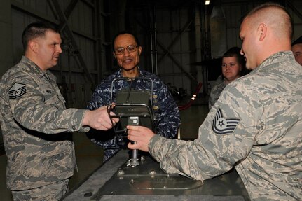 WHITEMAN AIR FORCE BASE, Mo. (March 10, 2014) Members of the 509th Aircraft Maintenance Squadron and Munitions Squadron explain the specifics of a MHU-204 portable control unit to Adm. Cecil D. Haney, Commander, U.S. Strategic Command (USSTRATCOM) during Haney&#039;s visit to Whiteman Air Force Base. Haney asked the Airmen about their concerns and ideas for improving working and living conditions and stressed the importance of their contributions to our nation&#039;s nuclear deterrence mission. The 509th Bomb Wing supports USSTRATCOM&#039;s strategic deterrence mission by operating and maintaining B-2 Spirit bombers to deter strategic threats from adversaries and assure our allies of our commitment to their security. (U.S. Air Force photo by Staff Sgt. Alexandra M. Boutte/Released)