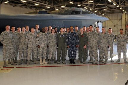 WHITEMAN AIR FORCE BASE, Mo. (March 10, 2014) Adm. Cecil D. Haney, Commander, U.S. Strategic Command (USSTRATCOM) stands with members of the 509th Bomb Wing for a group photo during Haney&#039;s visit to Whiteman Air Force Base. Haney asked the Airmen about their concerns and ideas for improving working and living conditions and stressed the importance of their contributions to our nation&#039;s nuclear deterrence mission. The 509th Bomb Wing supports USSTRATCOM&#039;s strategic deterrence mission by operating and maintaining B-2 Spirit bombers to deter strategic threats from adversaries and assure our allies of our commitment to their security. (U.S. Air Force photo by Staff Sgt. Alexandra M. Boutte/Released)