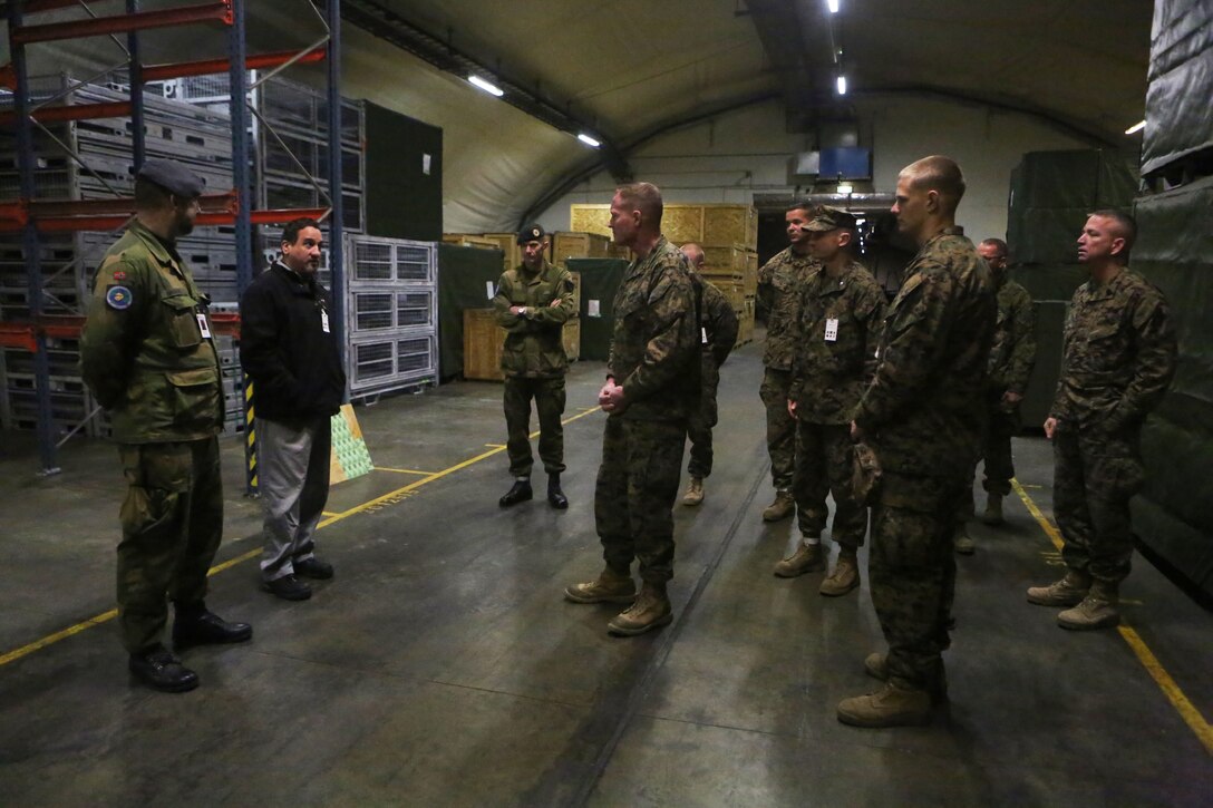 Brig. Gen Edward D. Banta (center), the commanding general of 2nd Marine Logistics Group, Sgt. Maj. George W. Young (far right), the sergeant major 2nd MLG, and command staff with 2nd Supply Battalion, Combat Logistics Regiment 25, 2nd MLG visit the Tromsdal cave in Norway, March 07, 2014. Banta visited the battalion to speak to the service members and check on the preparations the unit made for Cold Response 2014 and the Marine Corps Prepositioning Program – Norway, which supports crisis response, humanitarian assistance and Marine expeditionary operations. Cold Response 2014 is a Norwegian-led multinational exercise above the Arctic Circle designed prepare for crisis-response operations. 